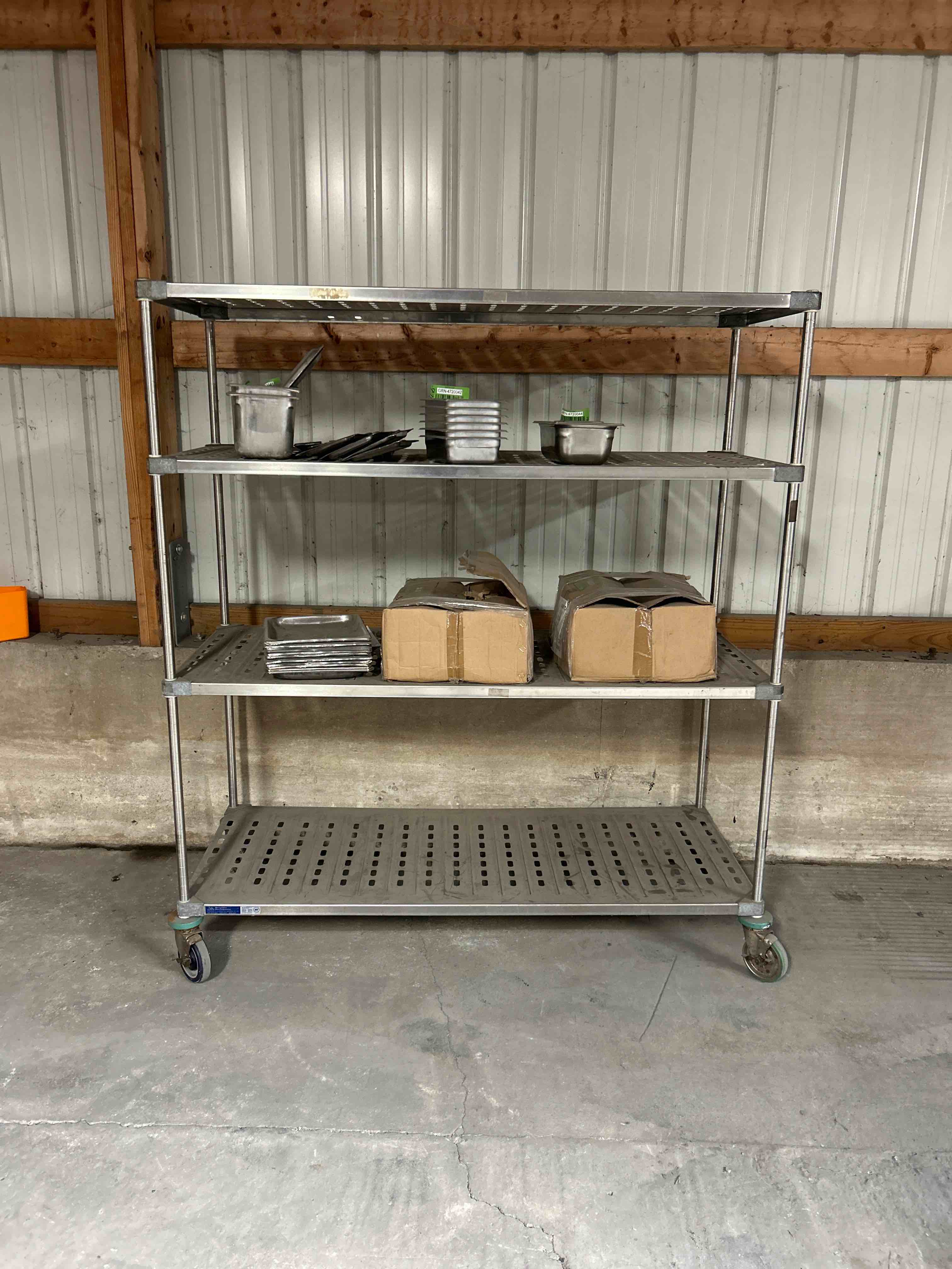 60x24x68 INCH 4 TIER CHROME RACK WITH CONTENTS ON CASTERS