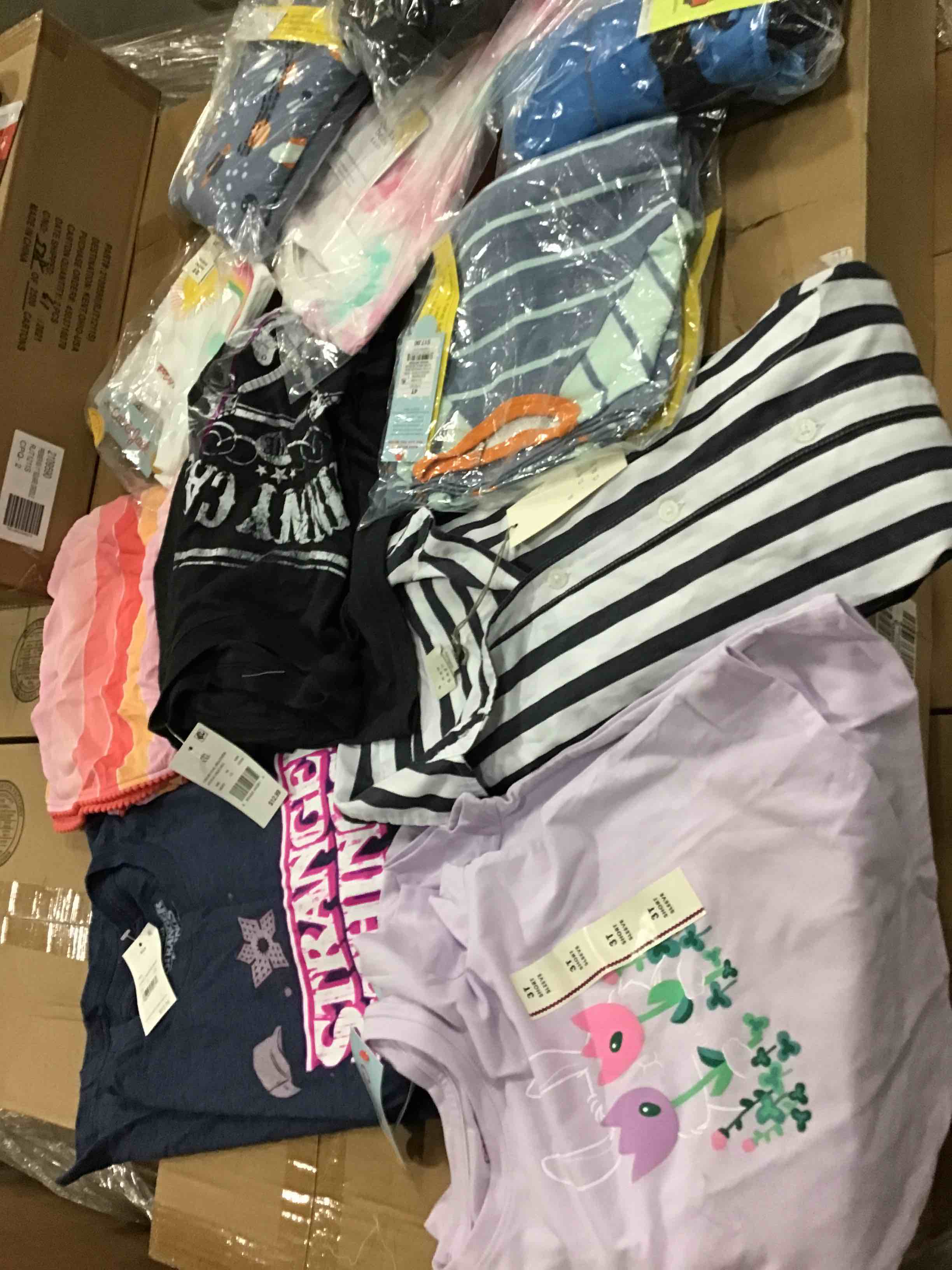 assorted clothing different sizes and colors 