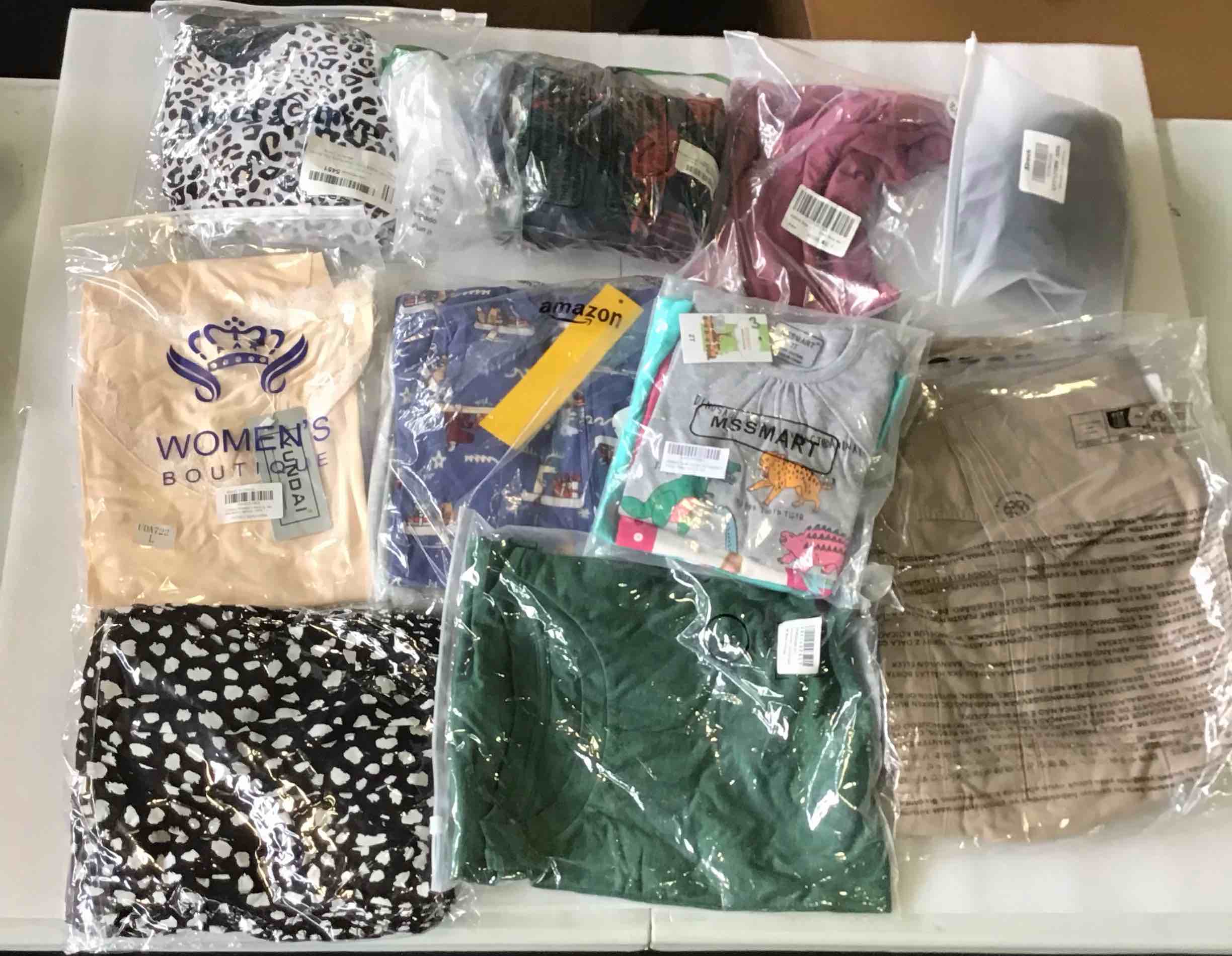 Men’s, Women’s, And Children’s Clothing  (12 pieces) 