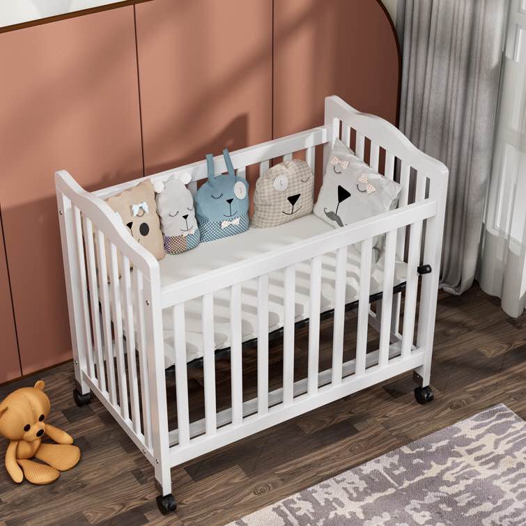 Hinojosa Mini Crib With 3 Position Adjustable Mattress Board