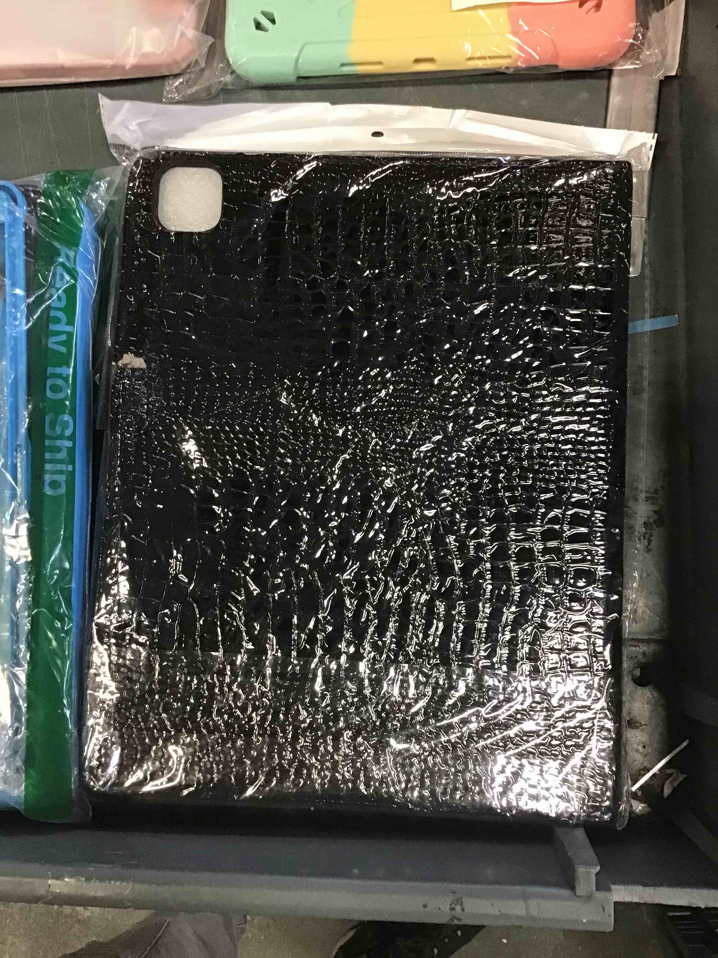 Box Lot of IPad Cases and MacBook Screen Protectors