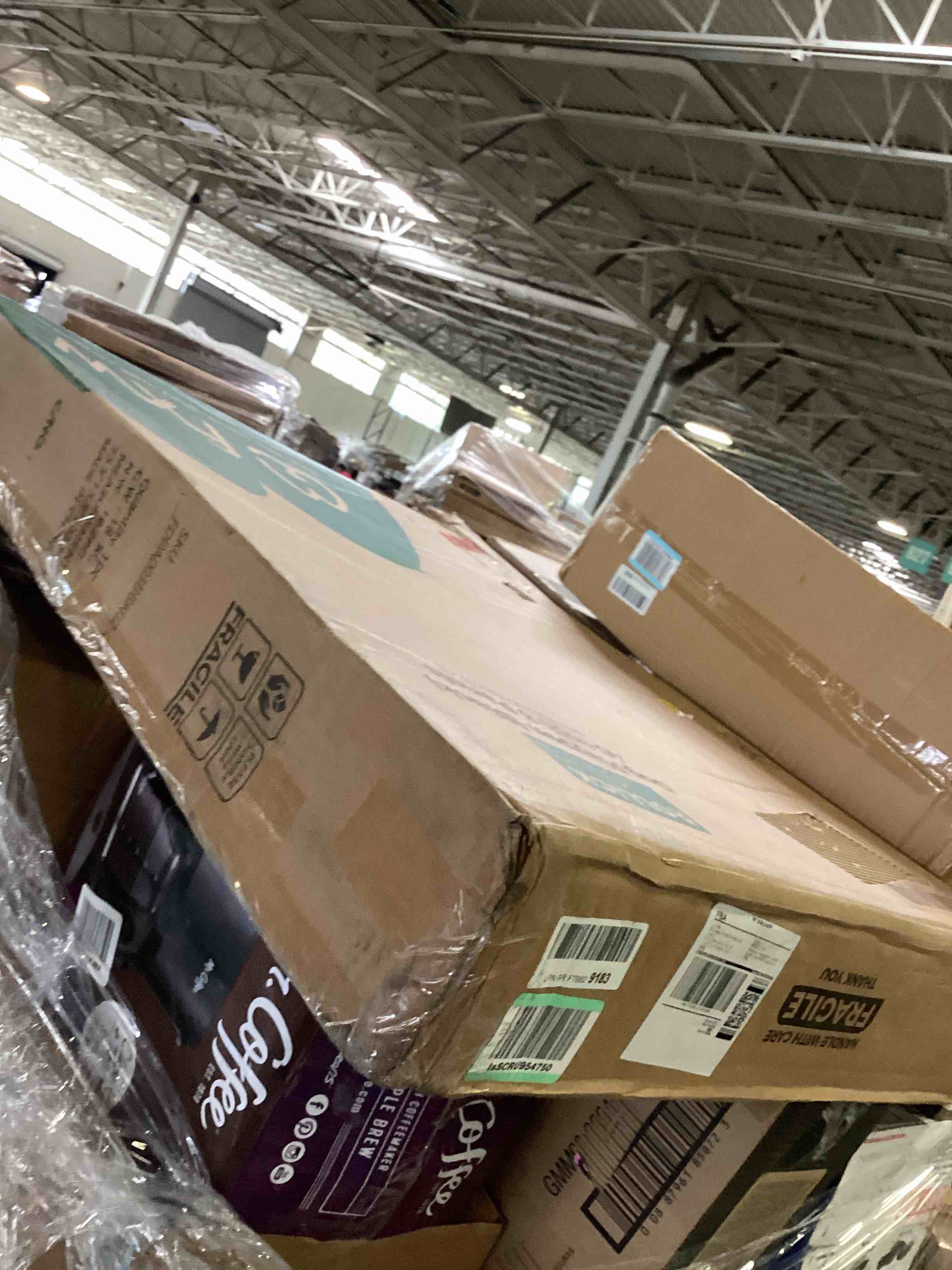 https://s3.amazonaws.com/lotting-images-prod/bidfta/GRN5393231_1689096224912.jpeg