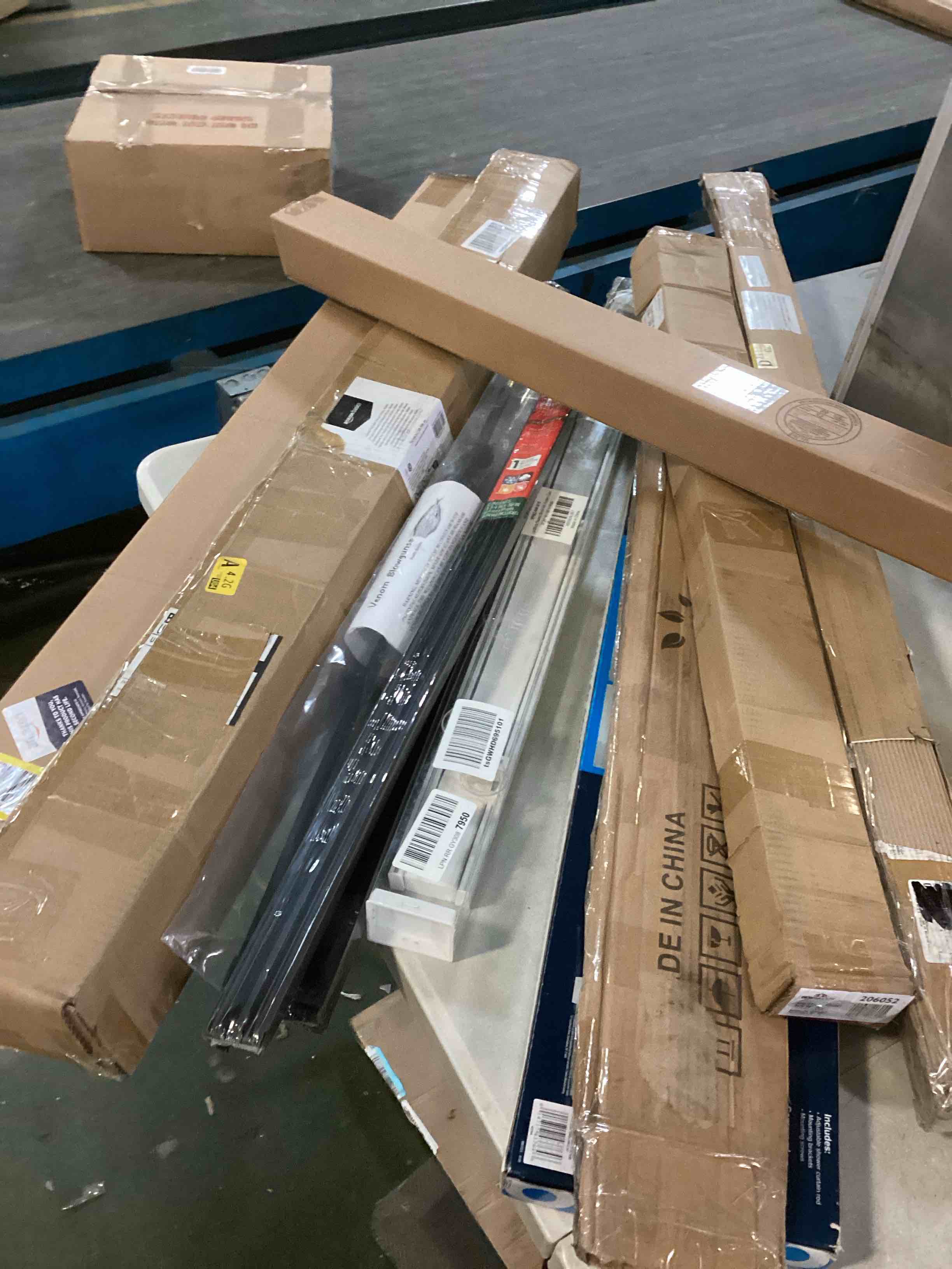 Assortment of Miscellaneous products (May Include cordless shade, curtain rods, retractable baby gate, Led universal linear lamp and more or other use)