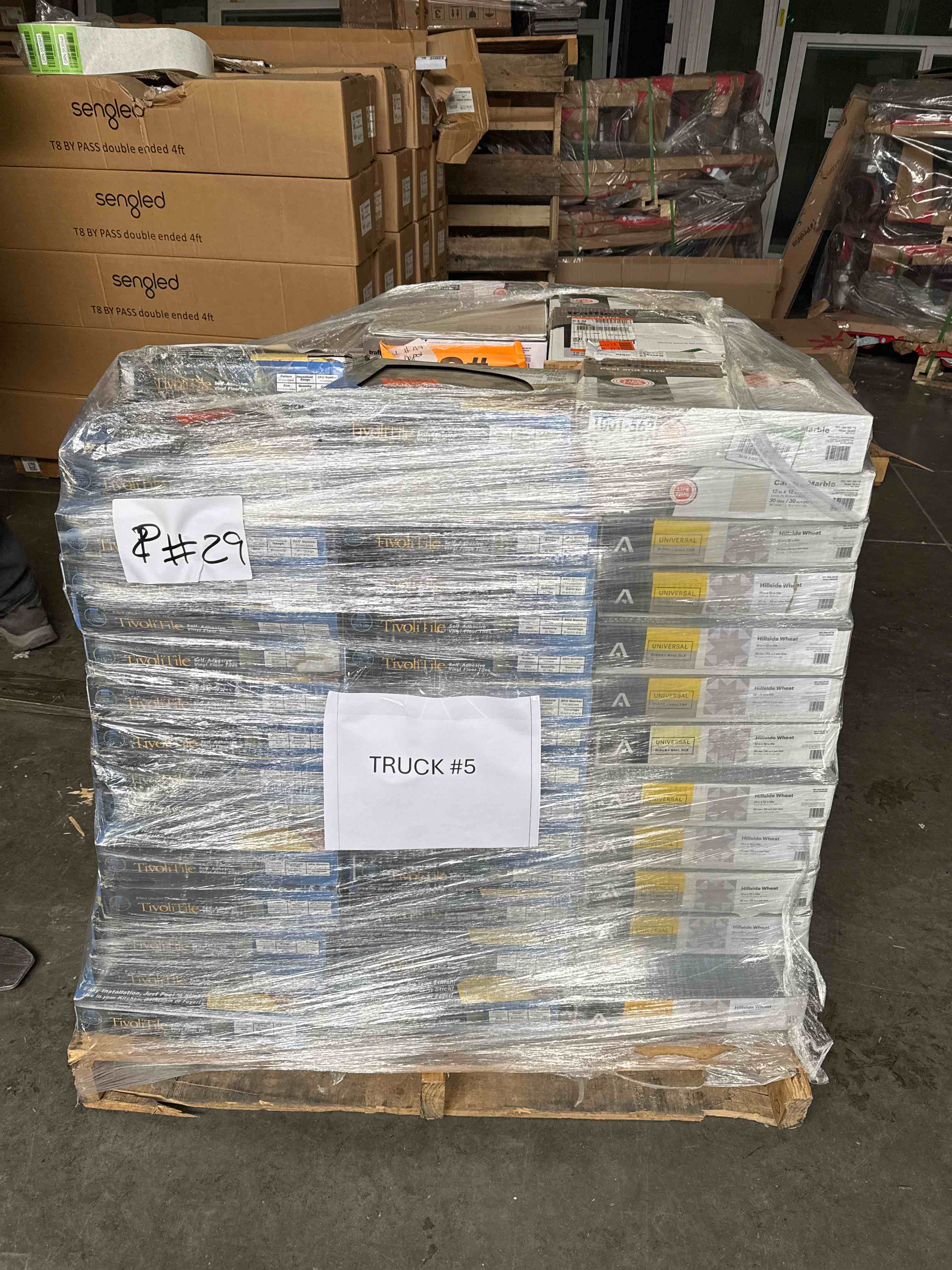 skid lot of assorted peel, and stick flooring