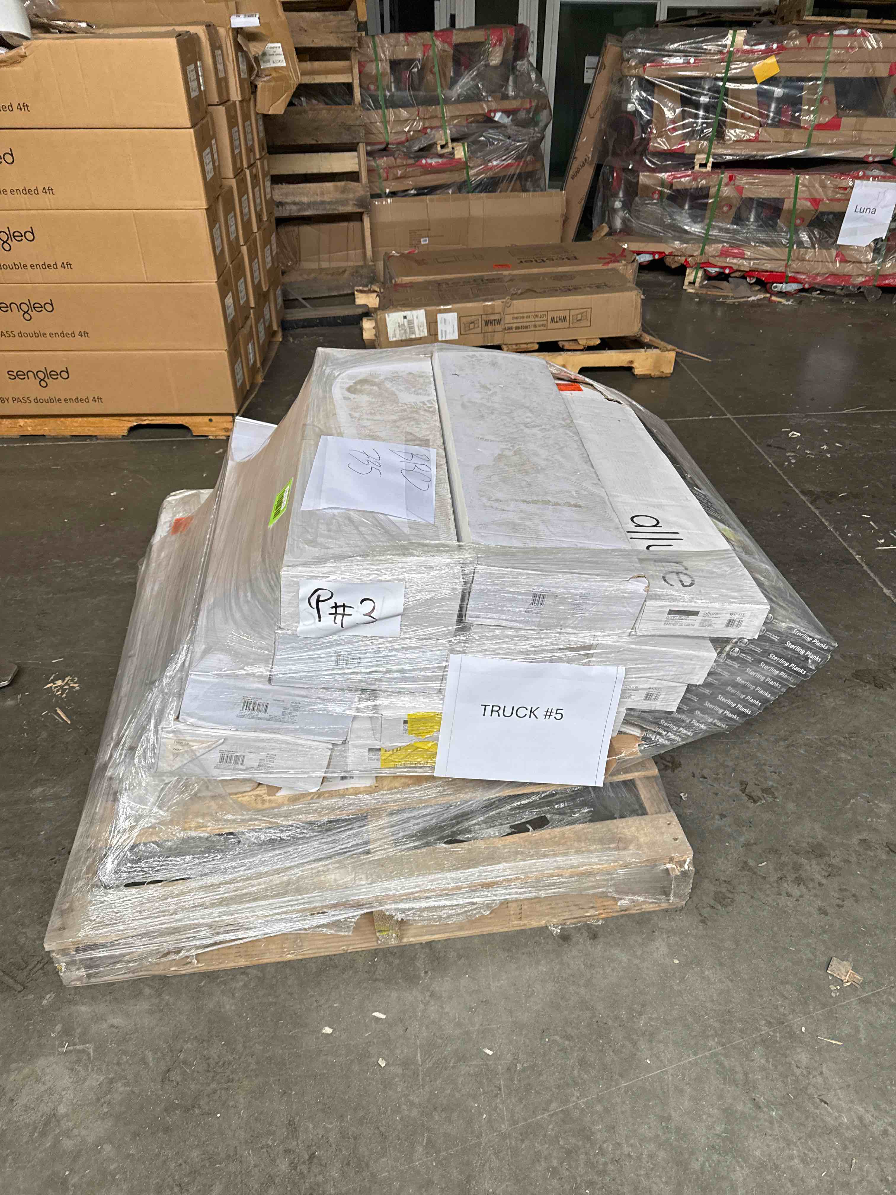 skid lot of assorted flooring