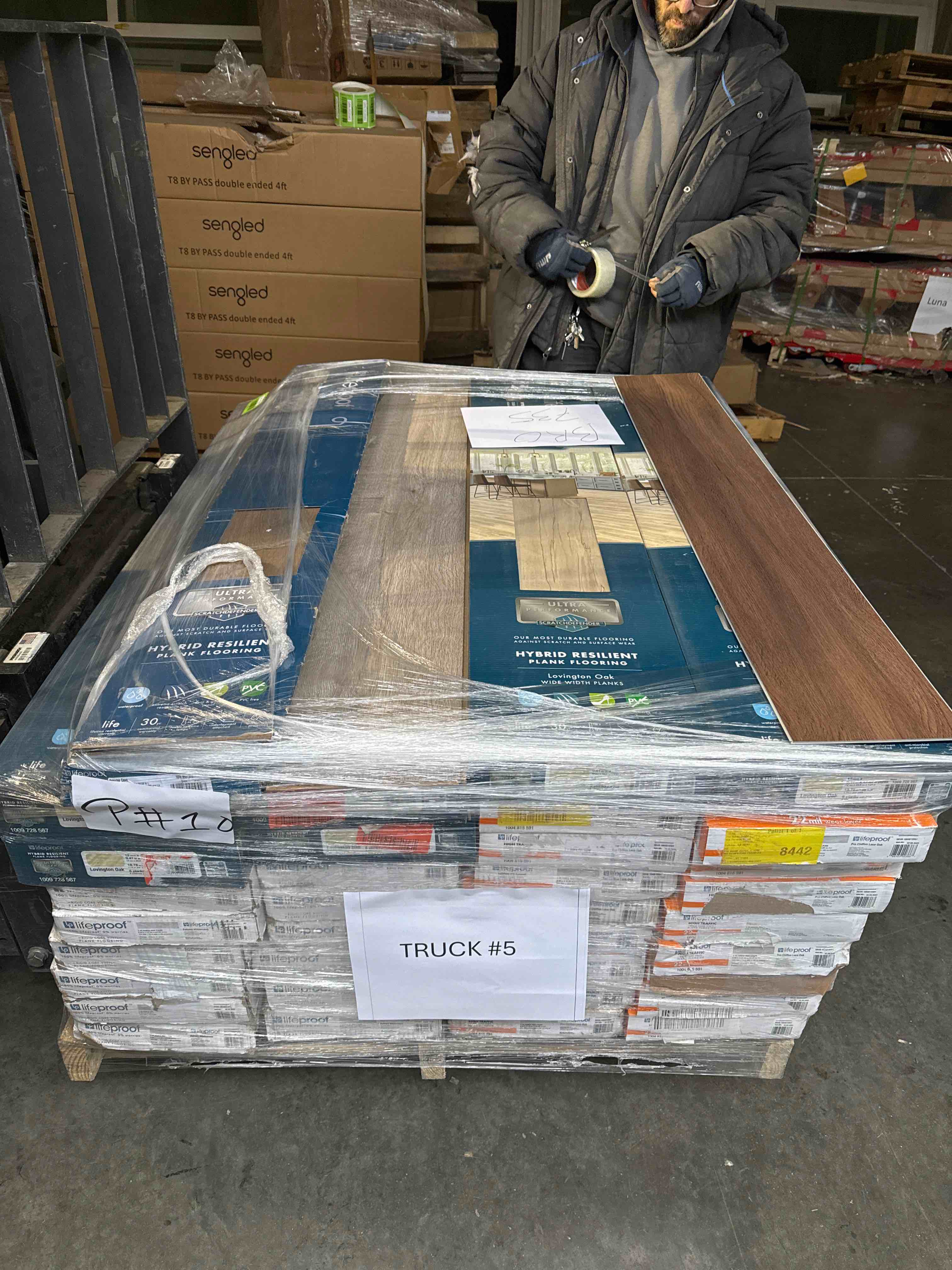 skid lot of assorted flooring