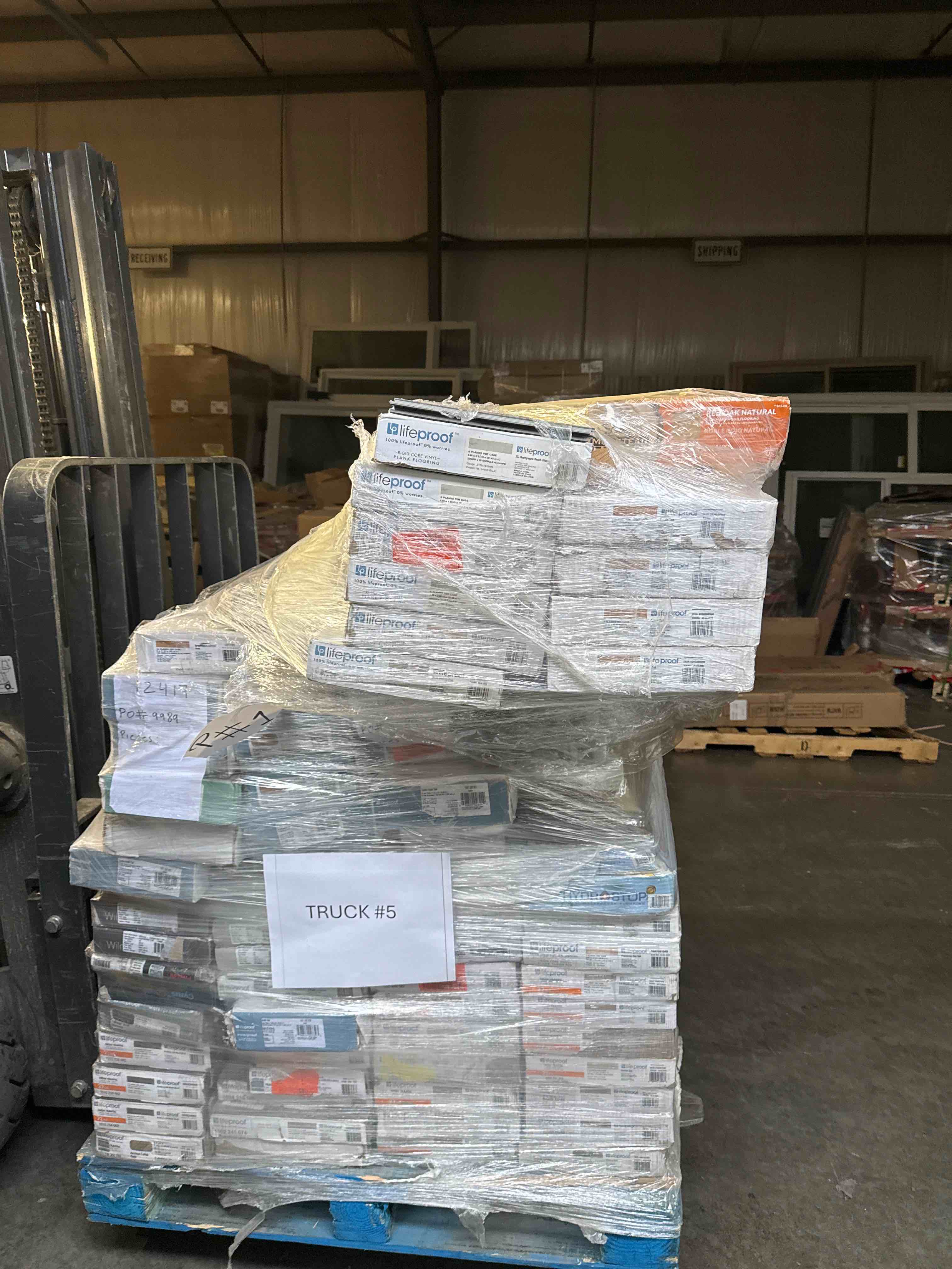 skid lot of assorted flooring