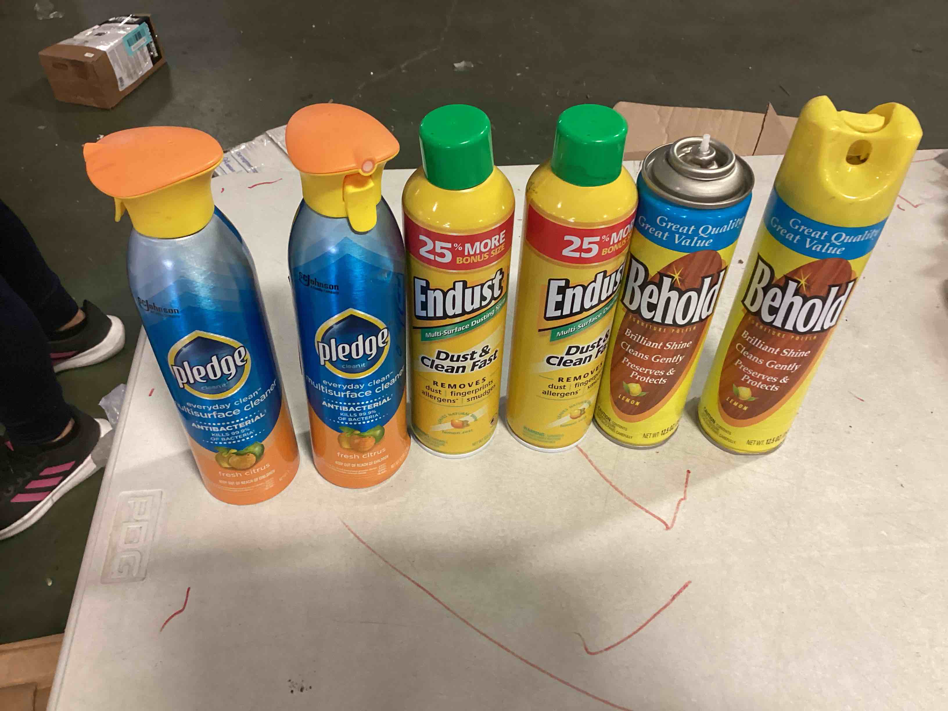 assorted pledge multisurface cleaner, Endust dust clean fast & Behold brilliant shine..