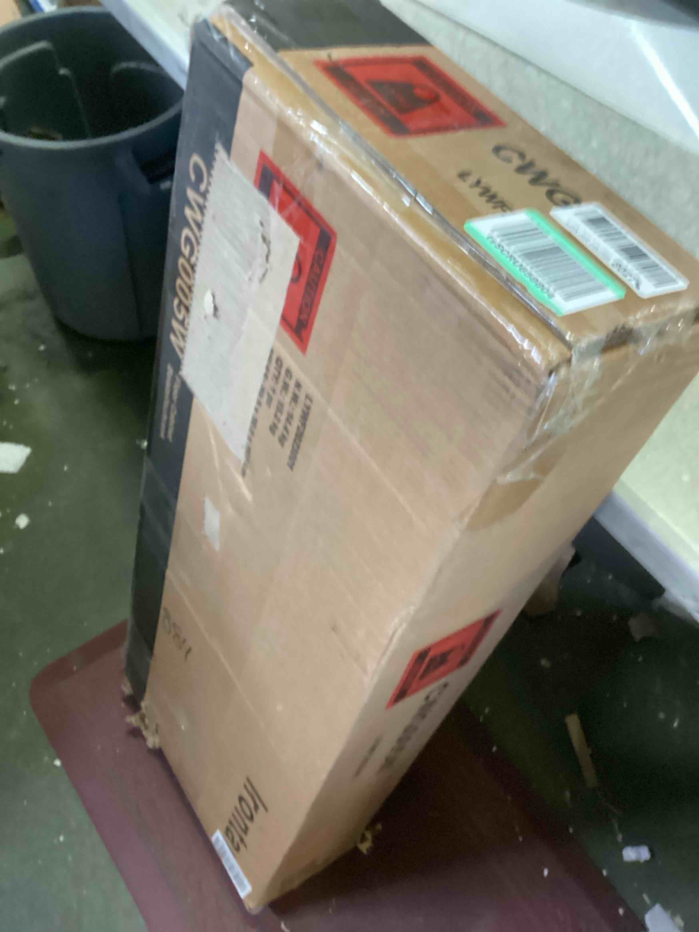 https://s3.amazonaws.com/lotting-images-prod/bidfta/GRN5628987_1702491114457.jpeg