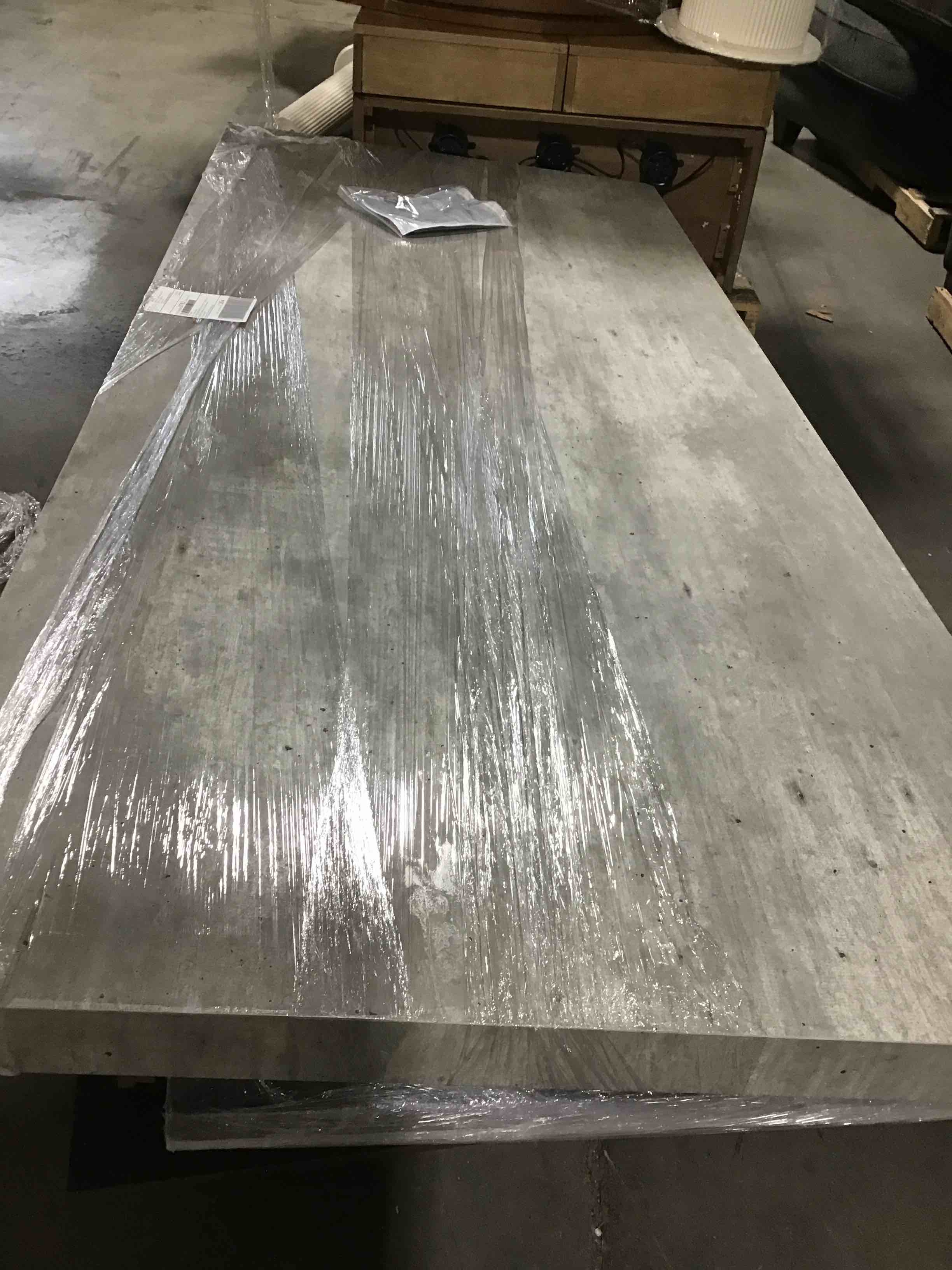 Condition photo showing As Is for Garnet 94" Dining Table by Kosas Home(incomplete top only)