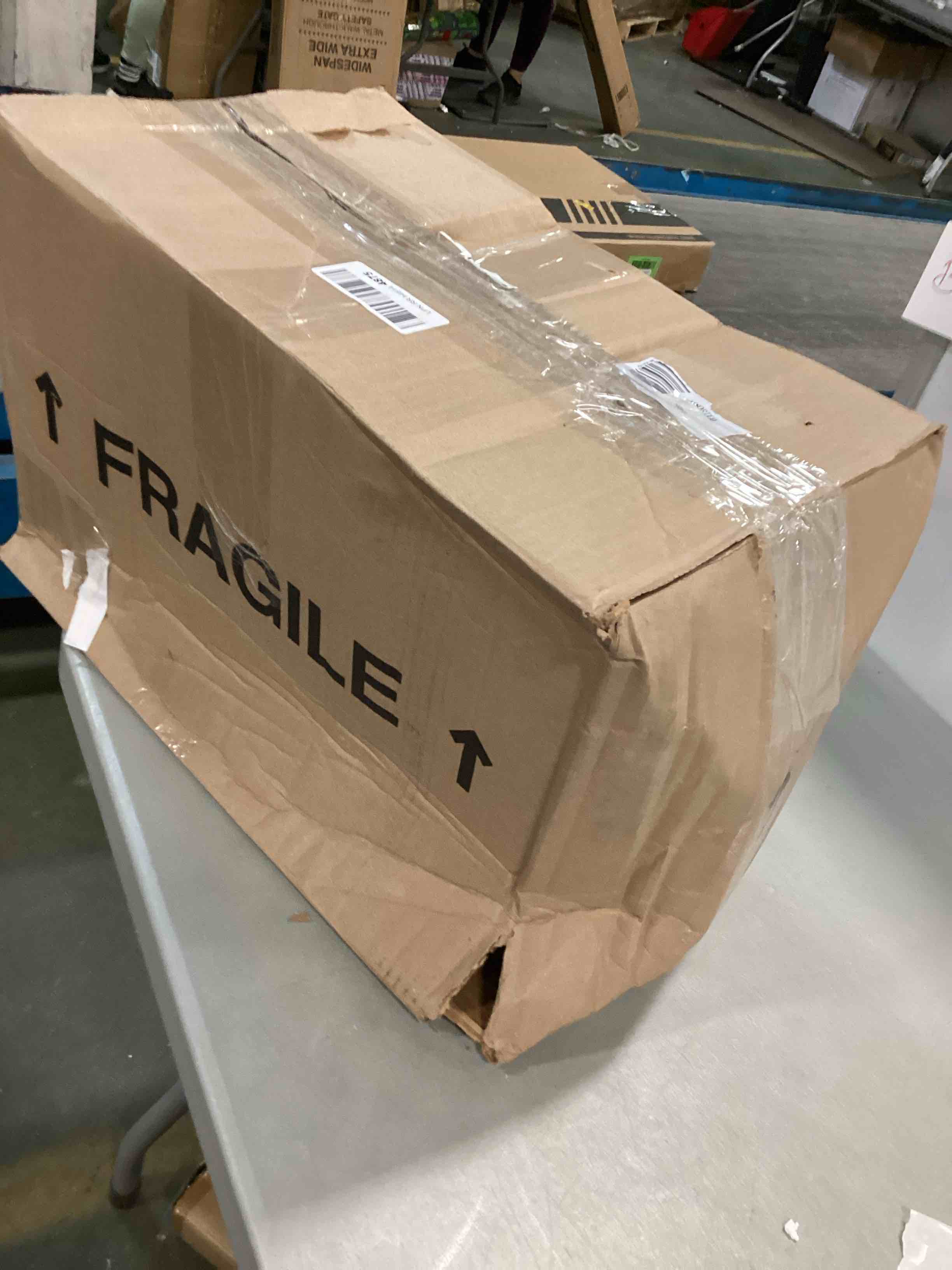https://s3.amazonaws.com/lotting-images-prod/bidfta/GRN5732631_1703769112401.jpeg