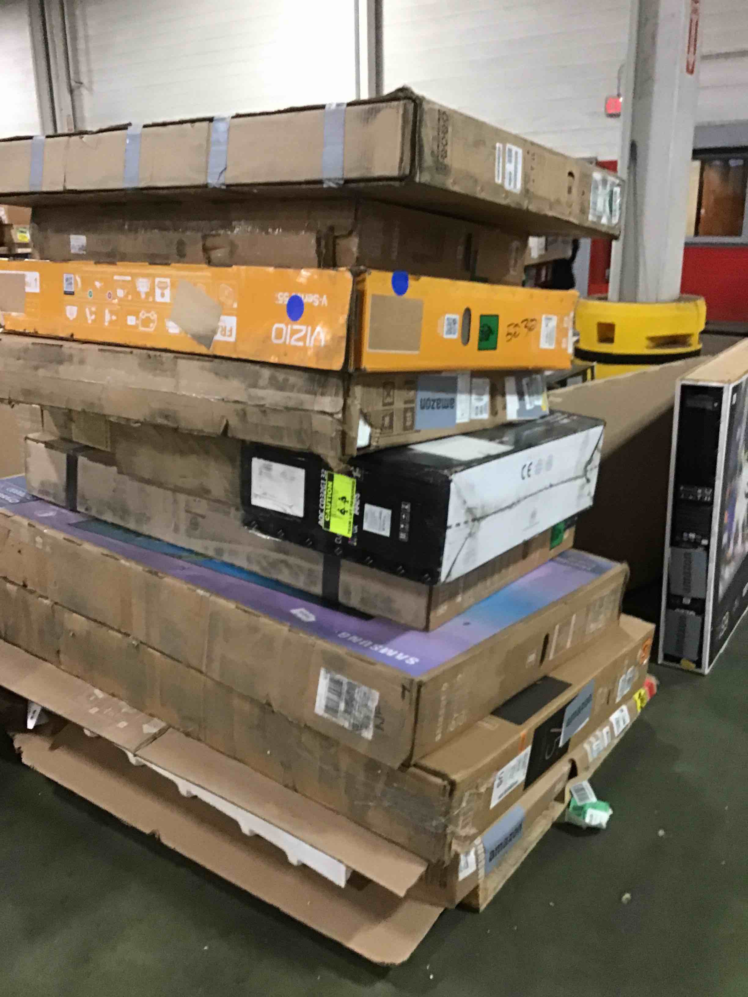 pallet of defective televisions,monitor(for parts)