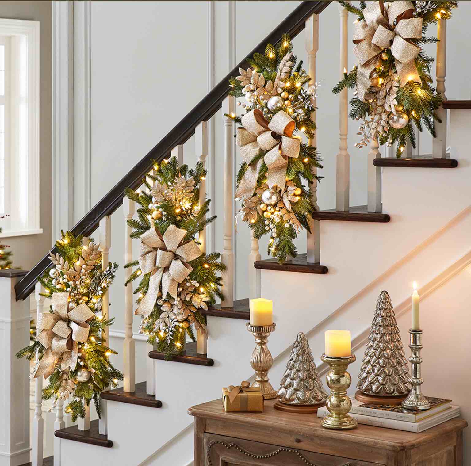 The Cordless Prelit Silver And Champagne Stairway Swag