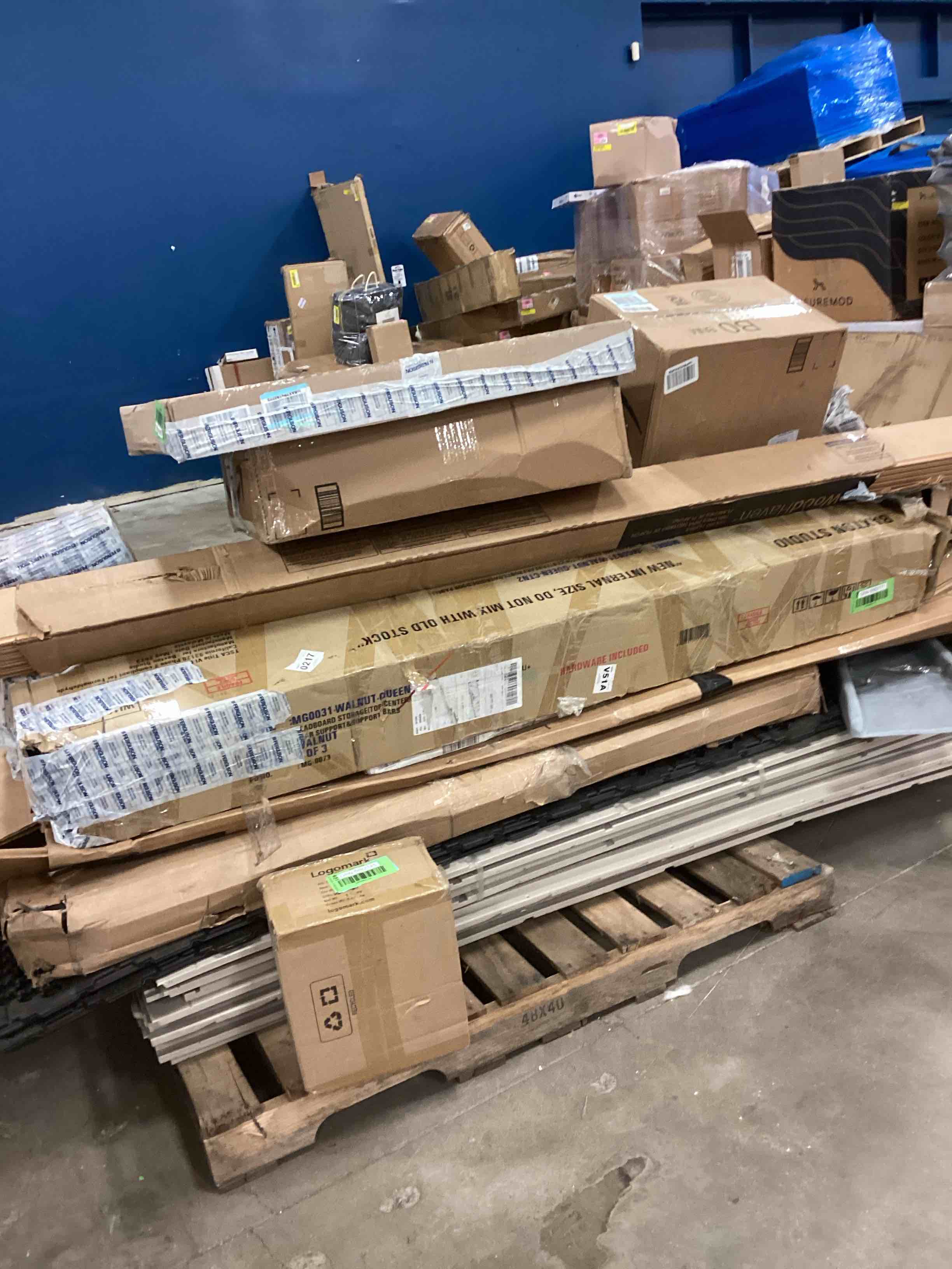 Assorted item include,paint, furniture, alcohol,baby gate,curtain rod and more.