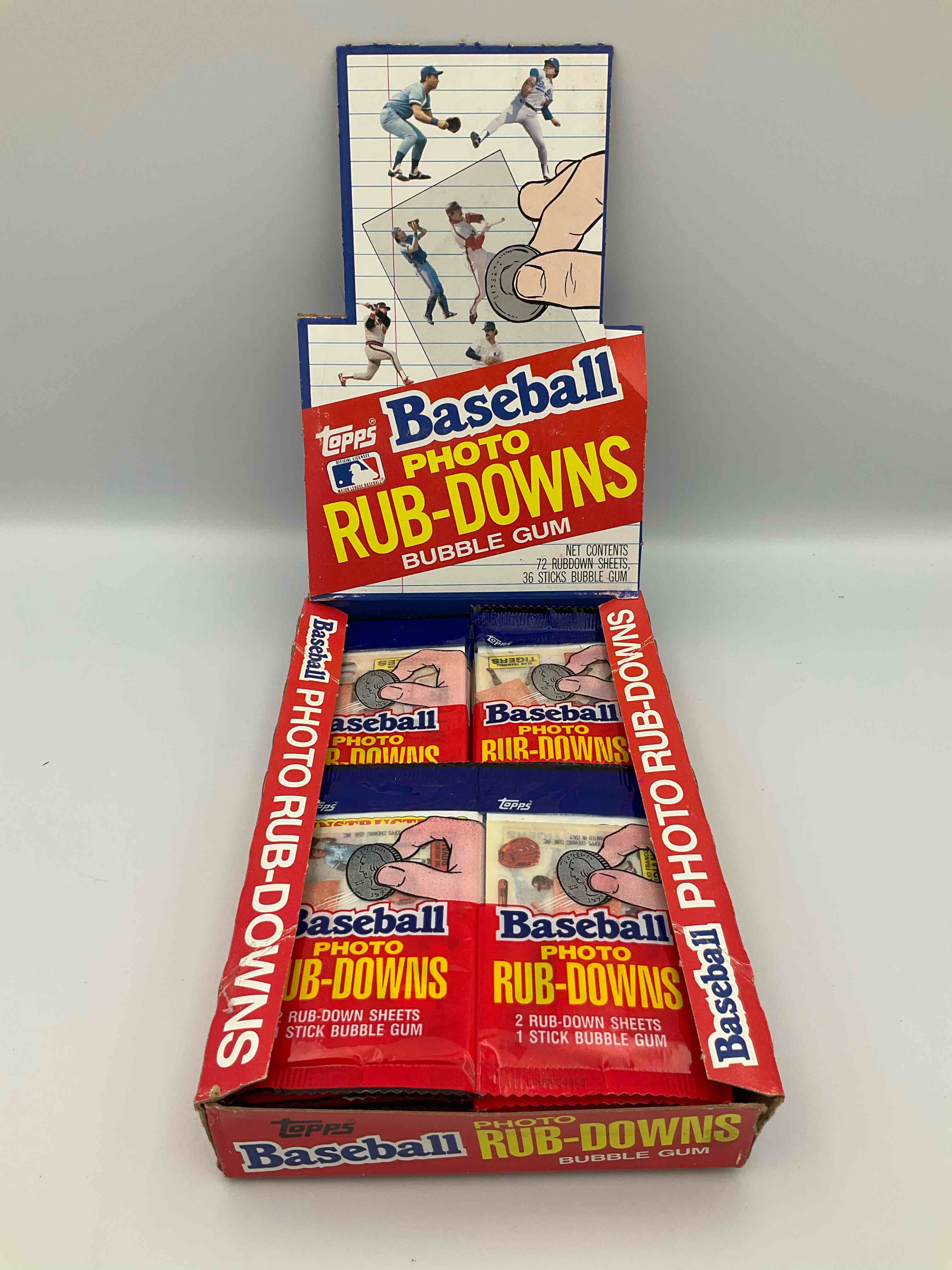 1984 Rare Baseball History! Search For You Favorite Vintage Team & Stars With These Sealed 1984 Baseball Rub-Down Graphic Card Packs, Direct From The Original Retail Case! Each Pack Contains Two Rub-Down Cards That When Scribbled Over Produce Super Cool Baseball Team & Player Graphics On Multiple Services. Rare Baseball History... Which Team & Players Will You Get? Potential Of Finding Don Mattingly, Gary Carter, Mike Schmidt & So Many More!