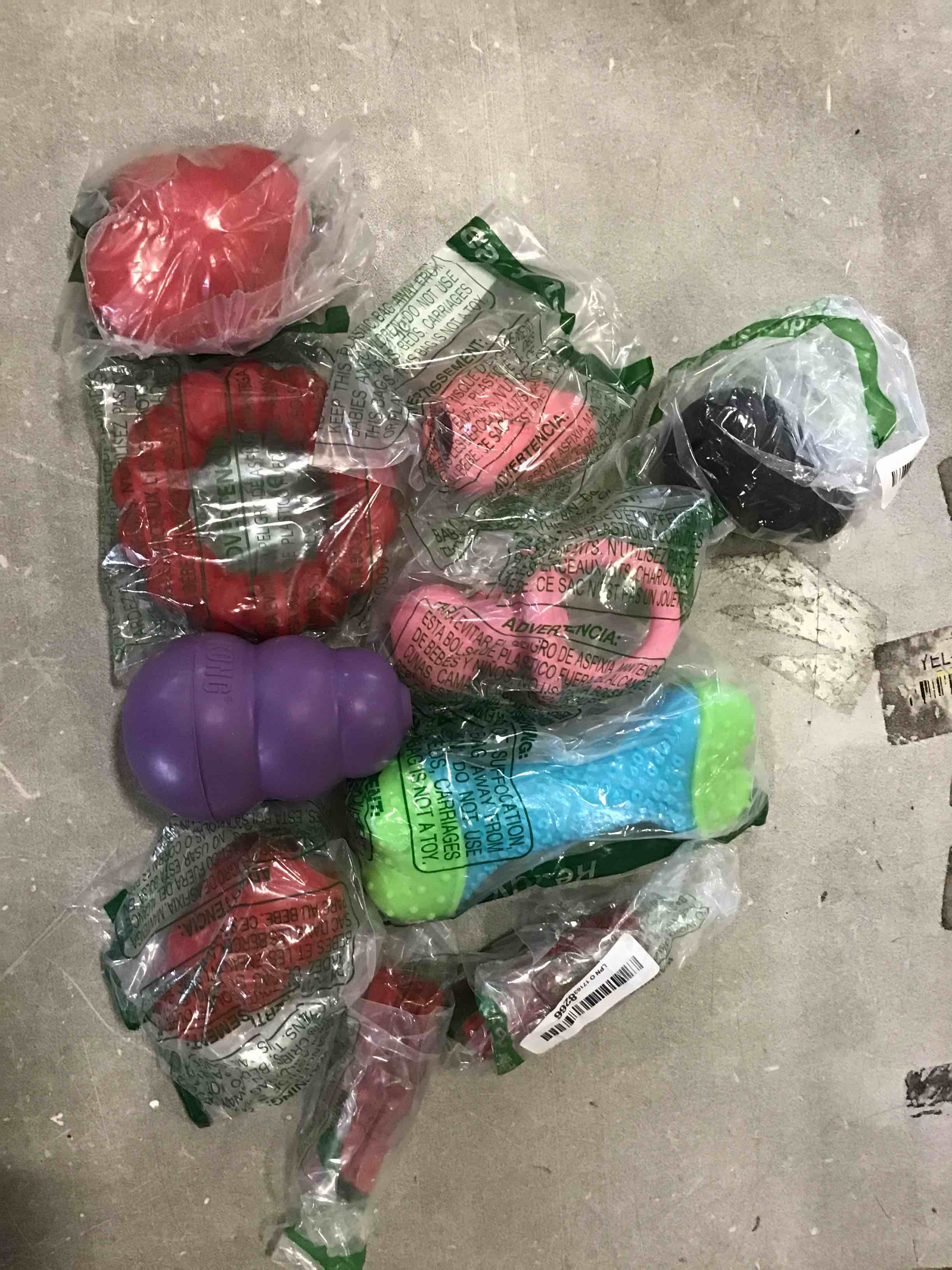 Assorted brand kong toys for dogs to chew on (( color and shapes and sizes are various))