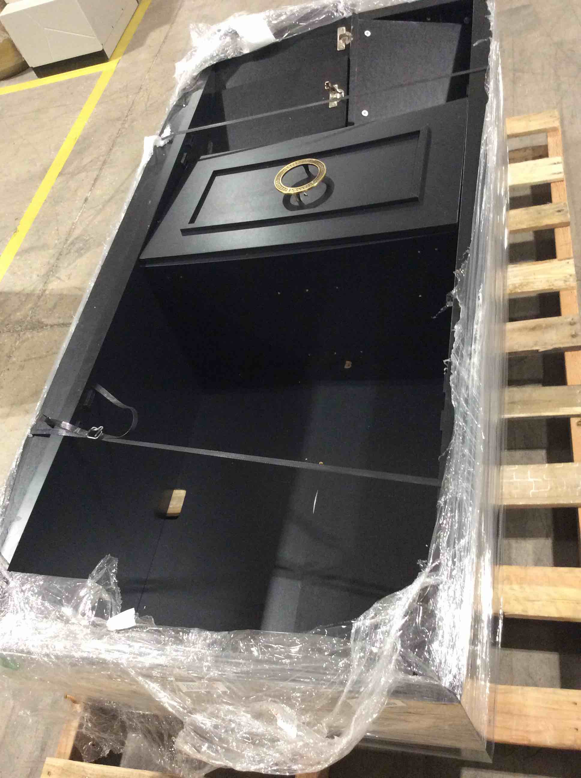 Black with gold handles entertainment center