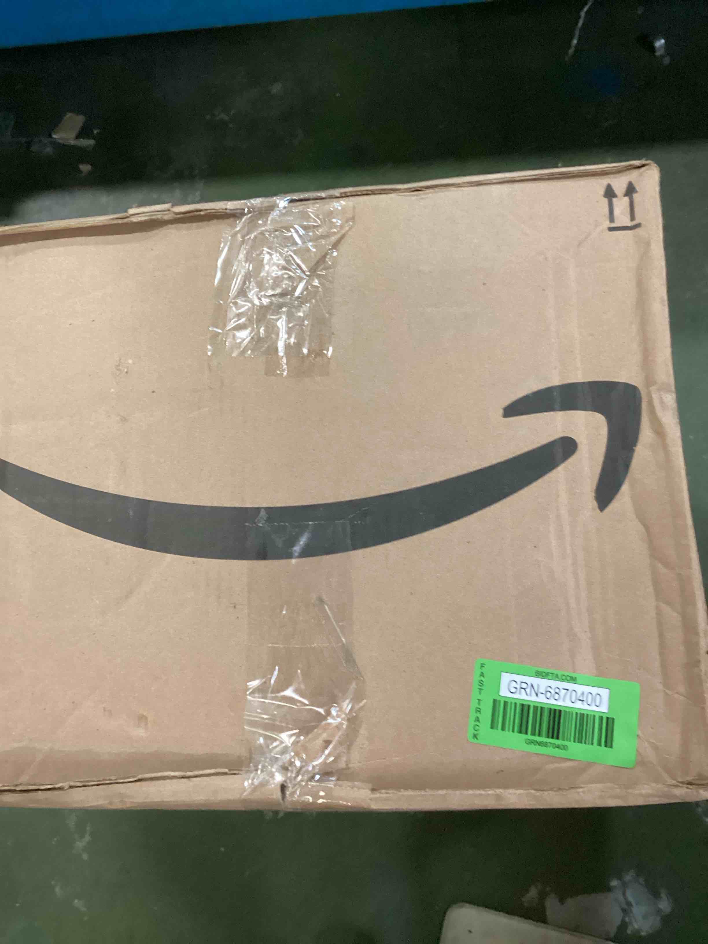 https://s3.amazonaws.com/lotting-images-prod/bidfta/GRN6870400_1722434187296.jpeg