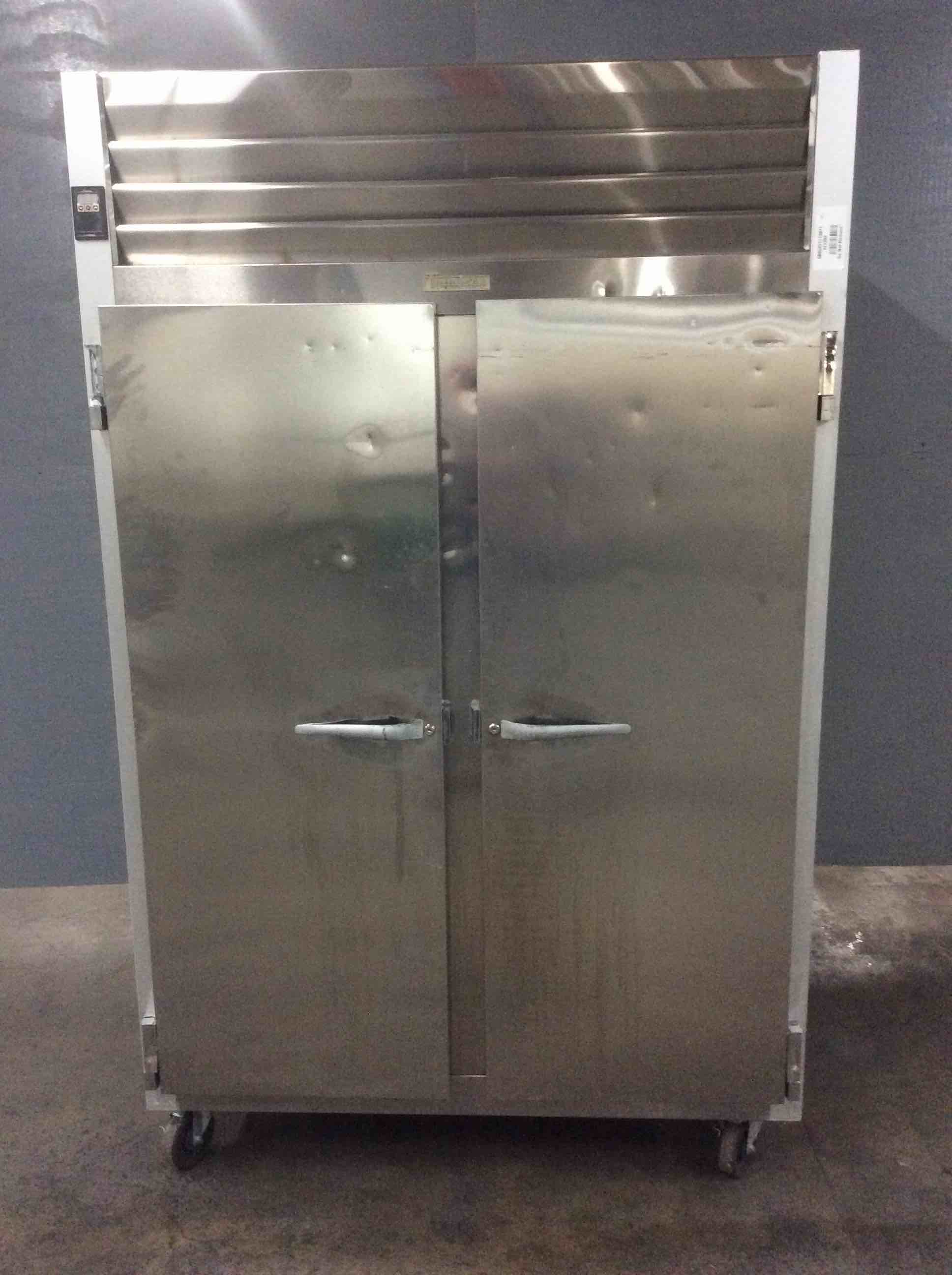 2014 TRAULSEN STAINLESS STEEL 2 DOOR REACH IN FREEZER ON CASTERS 