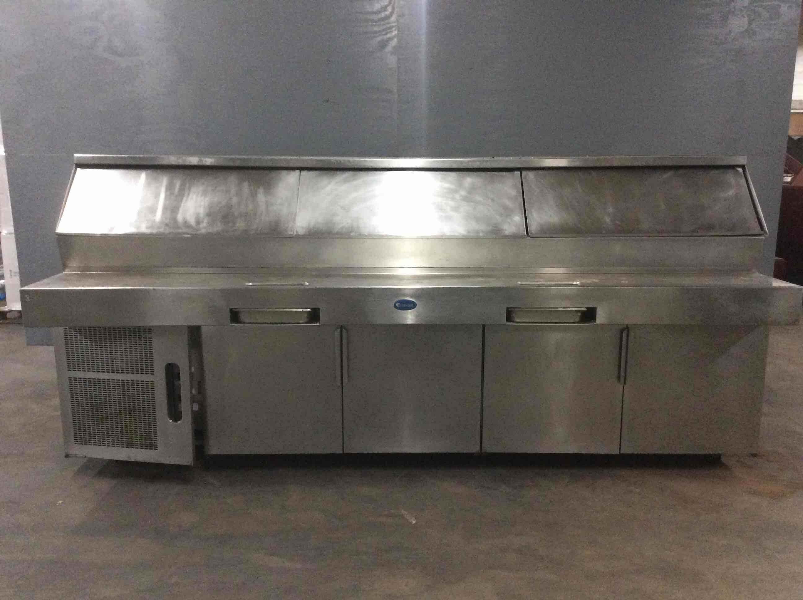 RANDELL 120 INCH STAINLESS STEEL 4 DOOR REFRIGERATED PIZZA PREP TABLE ON CASTERS 