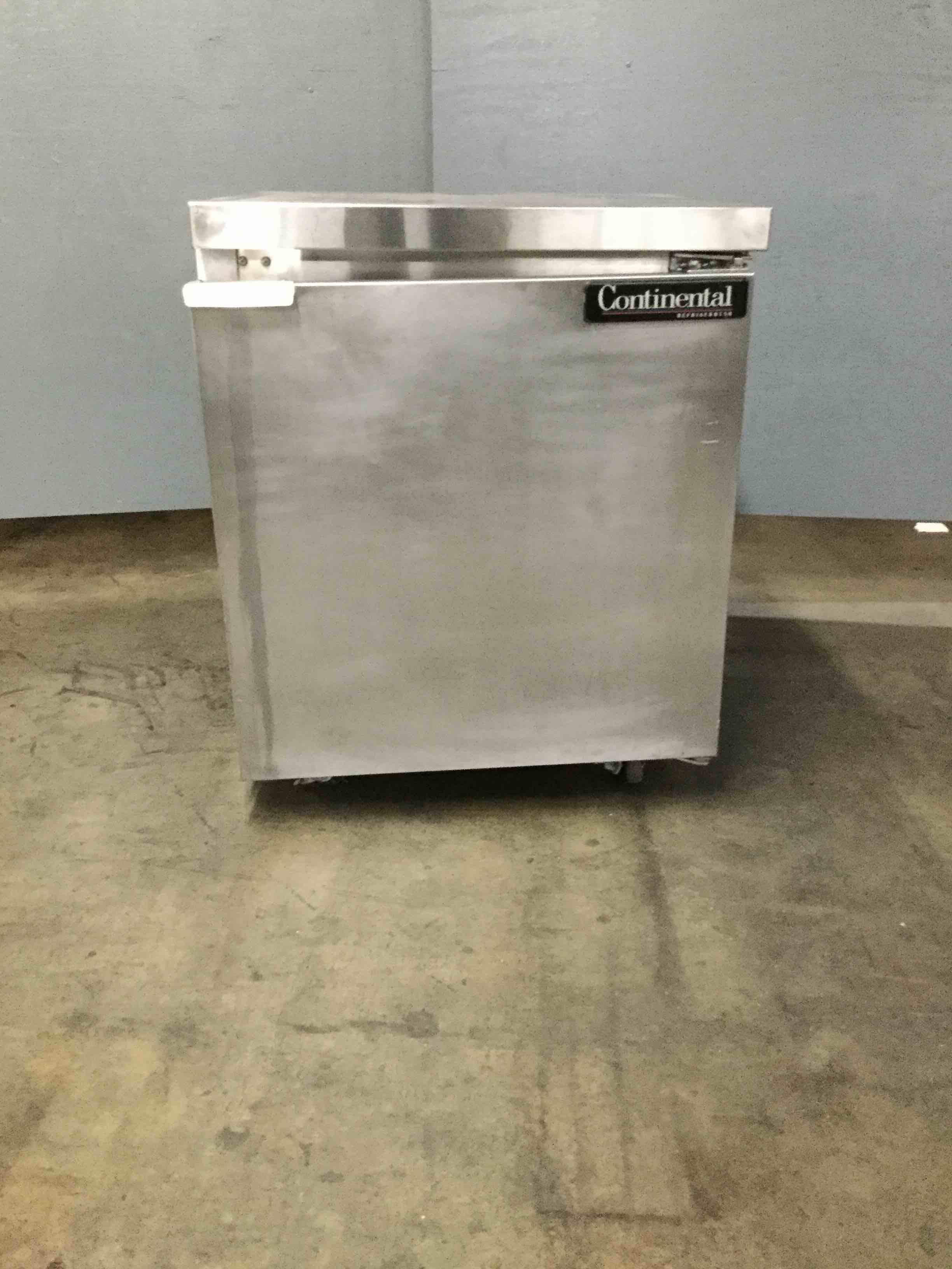 CONTINENTAL 27 INCH STAINLESS STEEL UNDER COUNTER FREEZER ON CASTERS