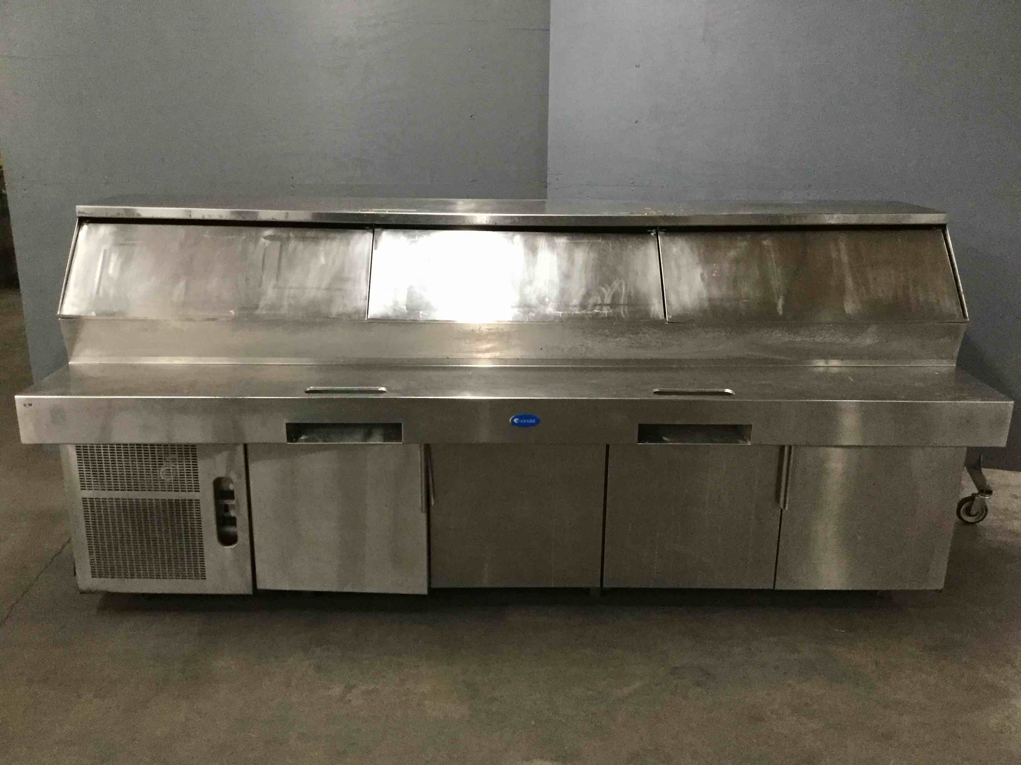 RANDELL 120 INCH STAINLESS STEEL REFRIGERATED PIZZA PREP TABLE ON CASTERS