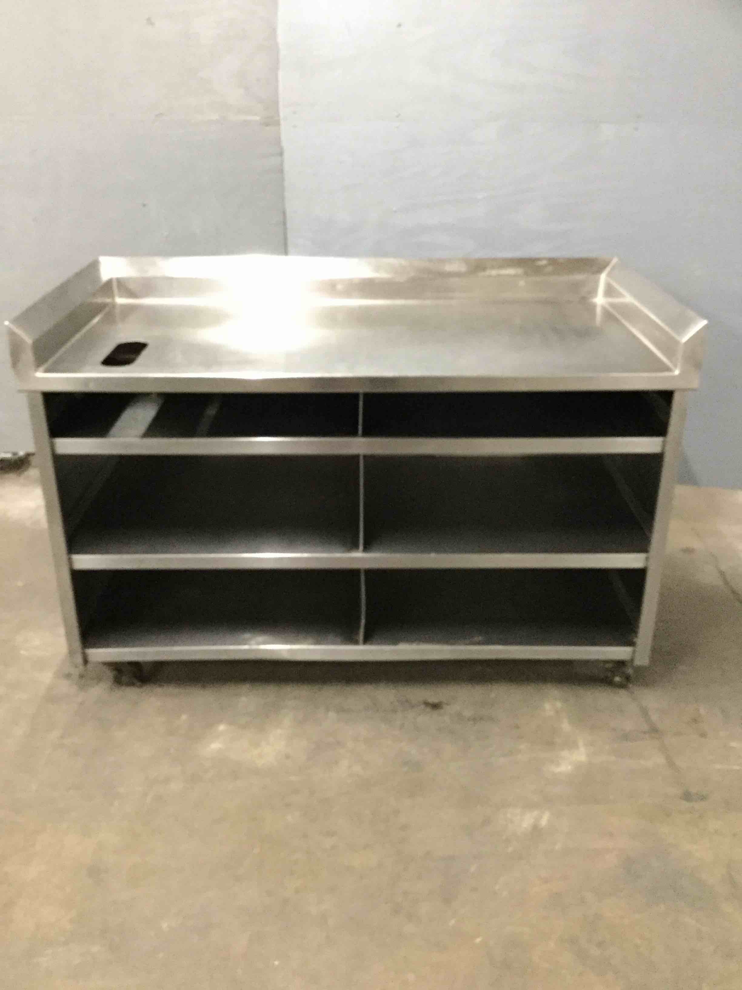 STAINLESS STEEL WORK STATION ON CASTERS 