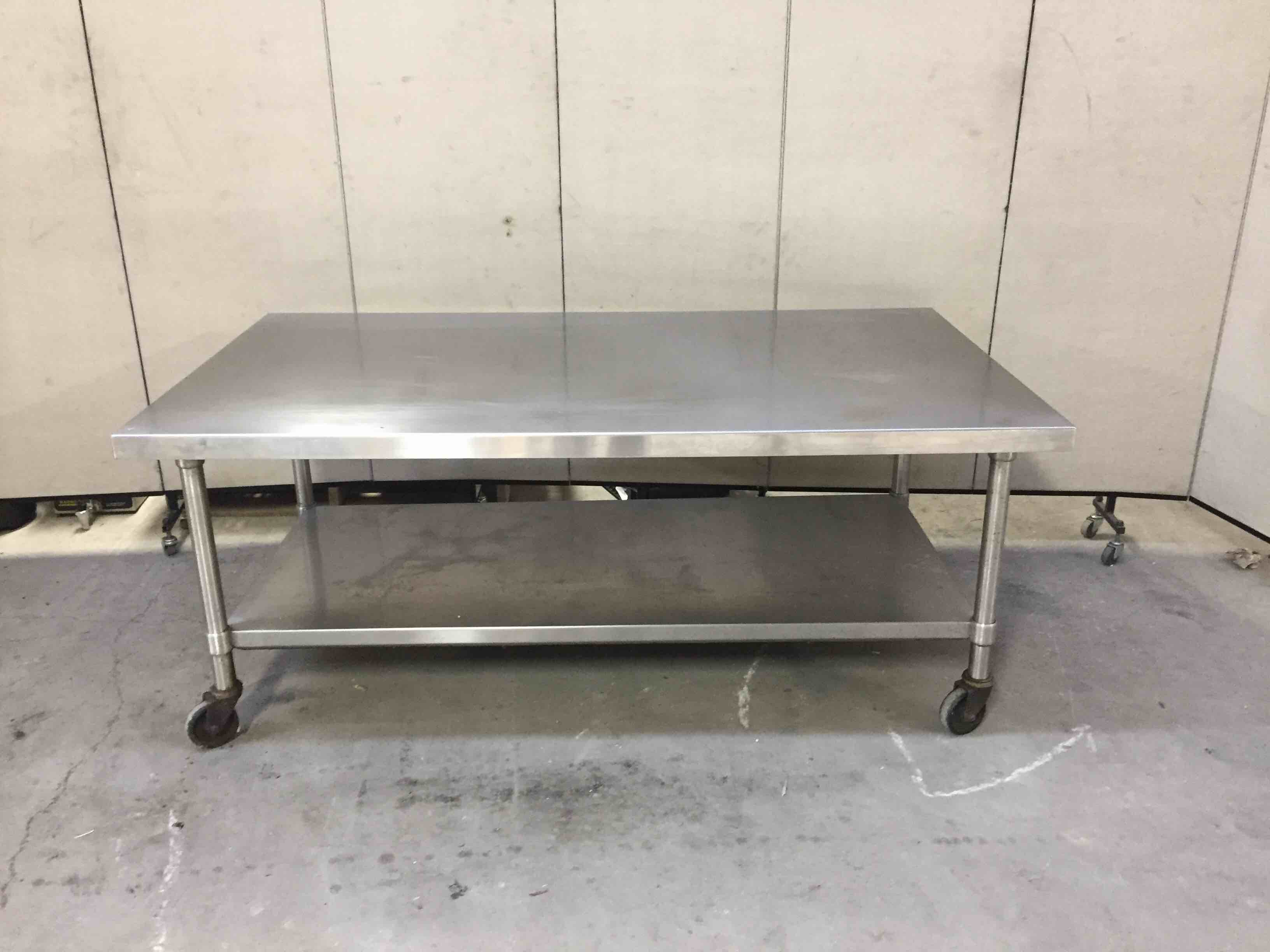 STAINLESS STEEL EQUIPMENT STAND ON CASTERS WITH UNDERSHELF 