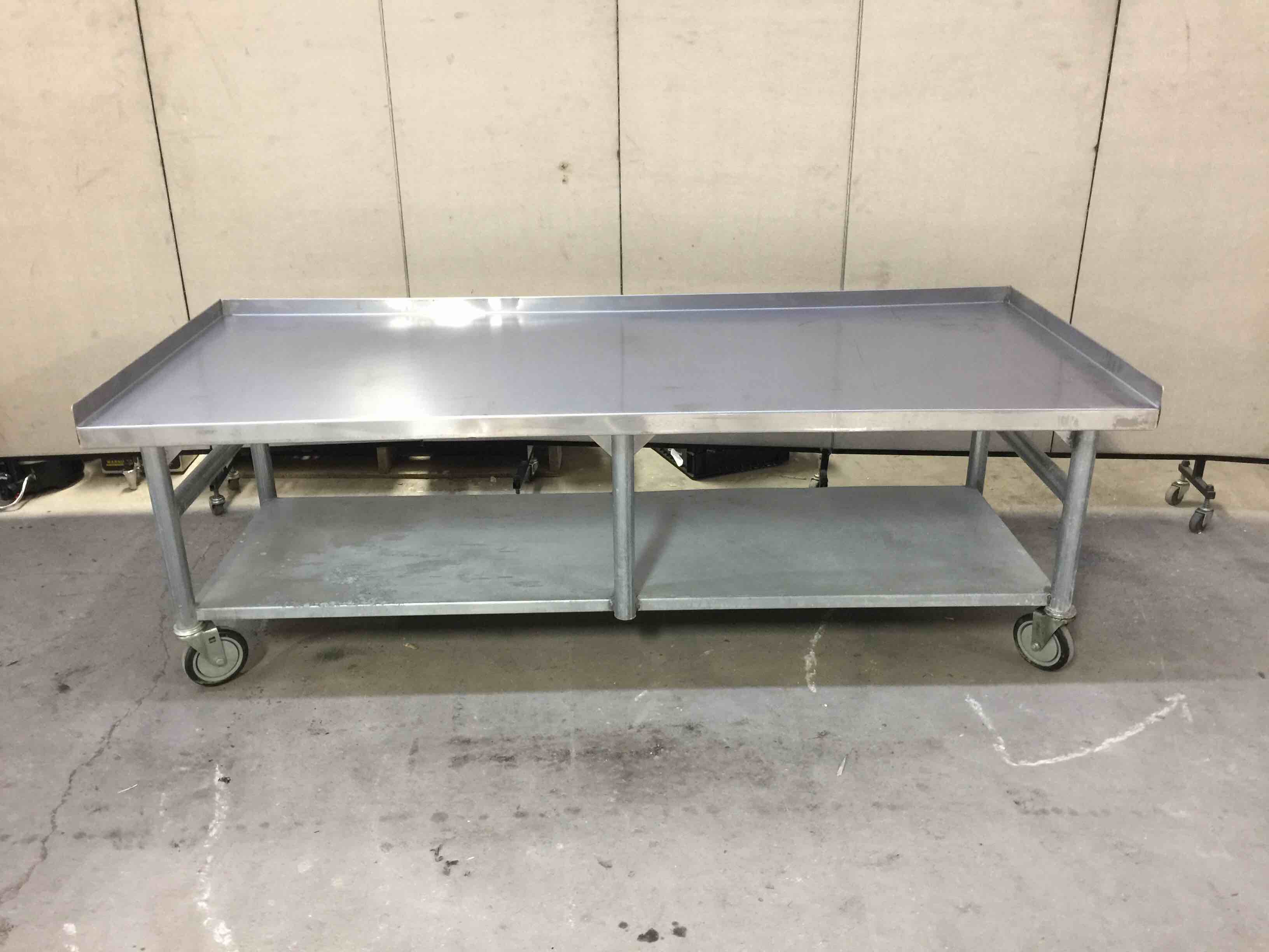 STAINLESS STEEL EQUIPMENT STAND ON CASTERS WITH UNDERSHELF 