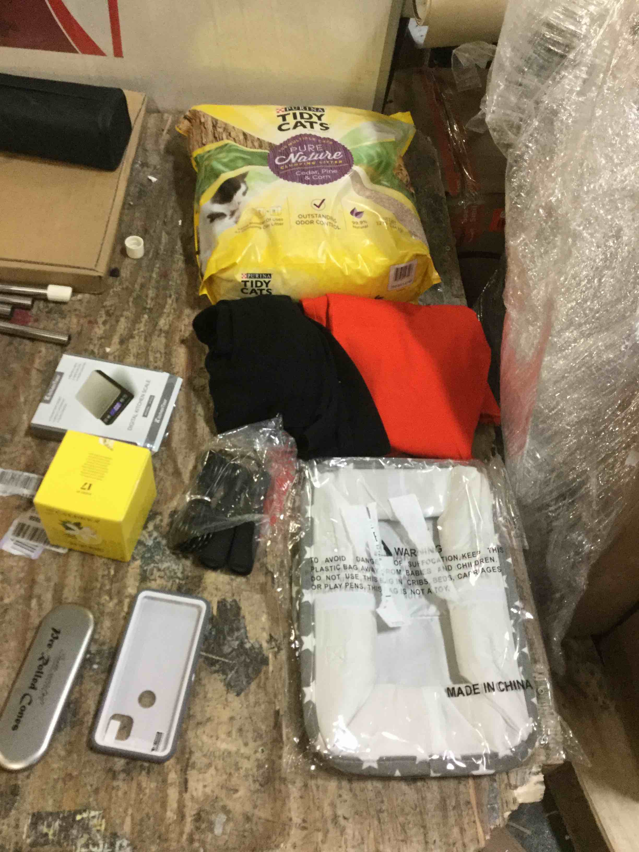 mix items.cat litter, women clothes,and more