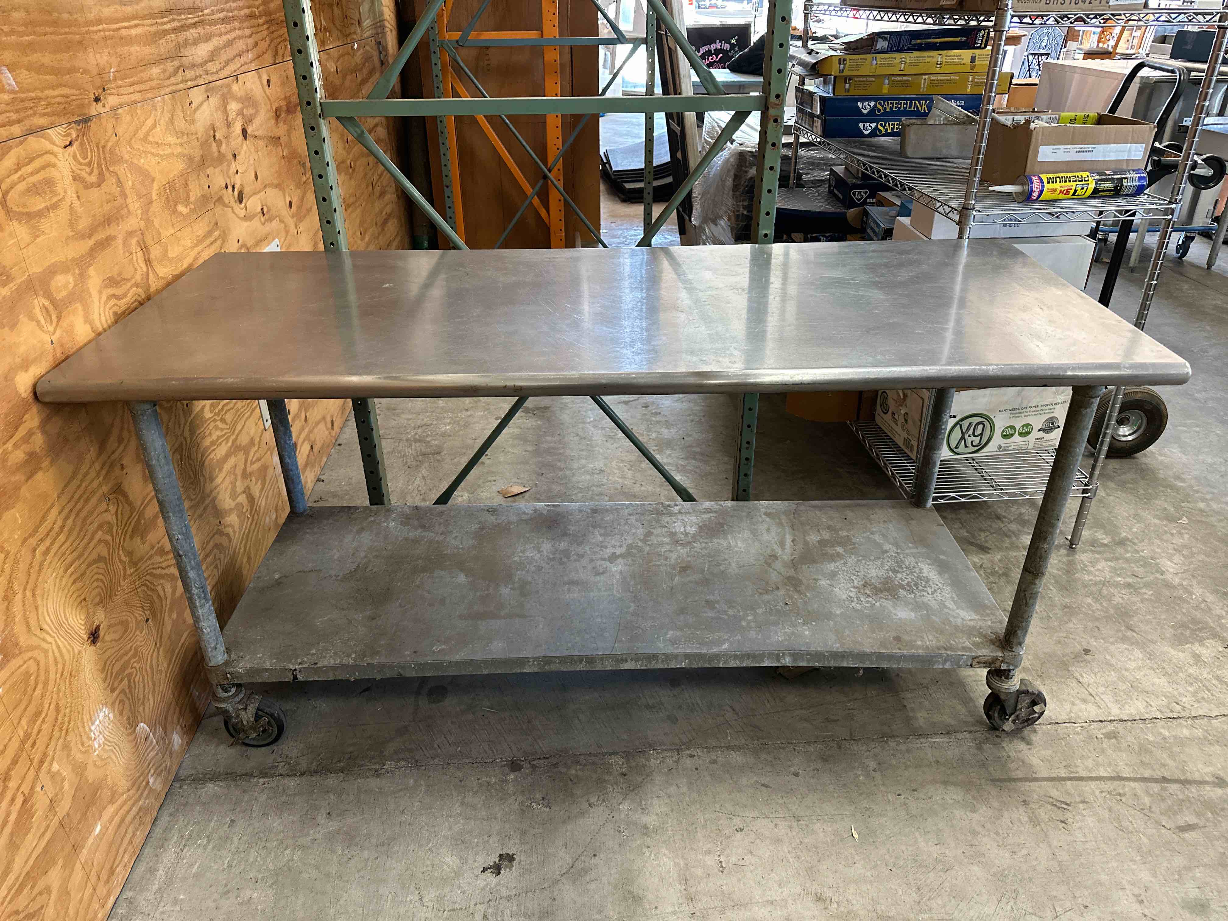 Stainless Steel Table With Under Shelf On Casters 