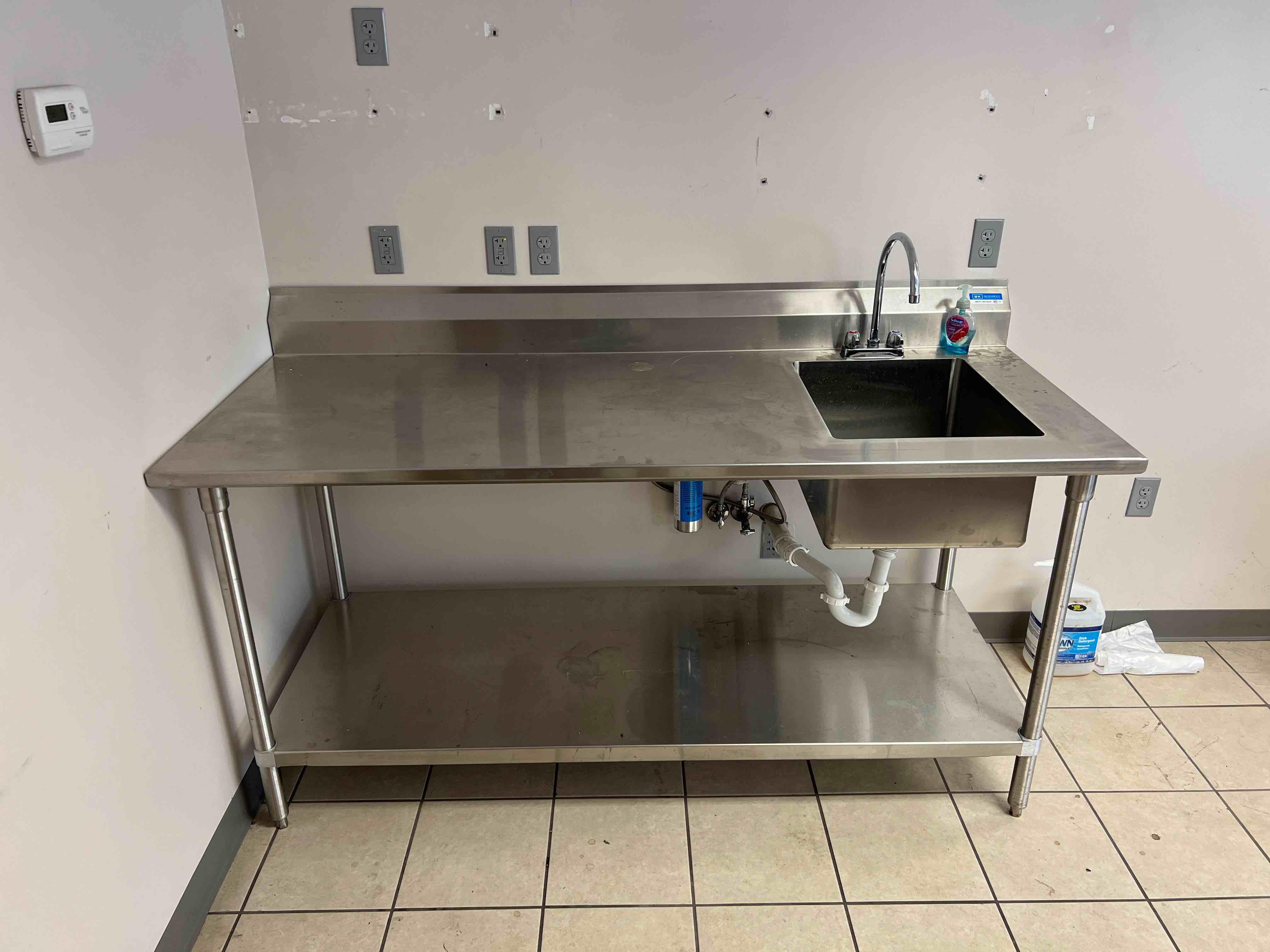 72 INCH ALL STAINLESS STEEL TABLE WITH SINK AND SIX INCH BACKSPLASH 