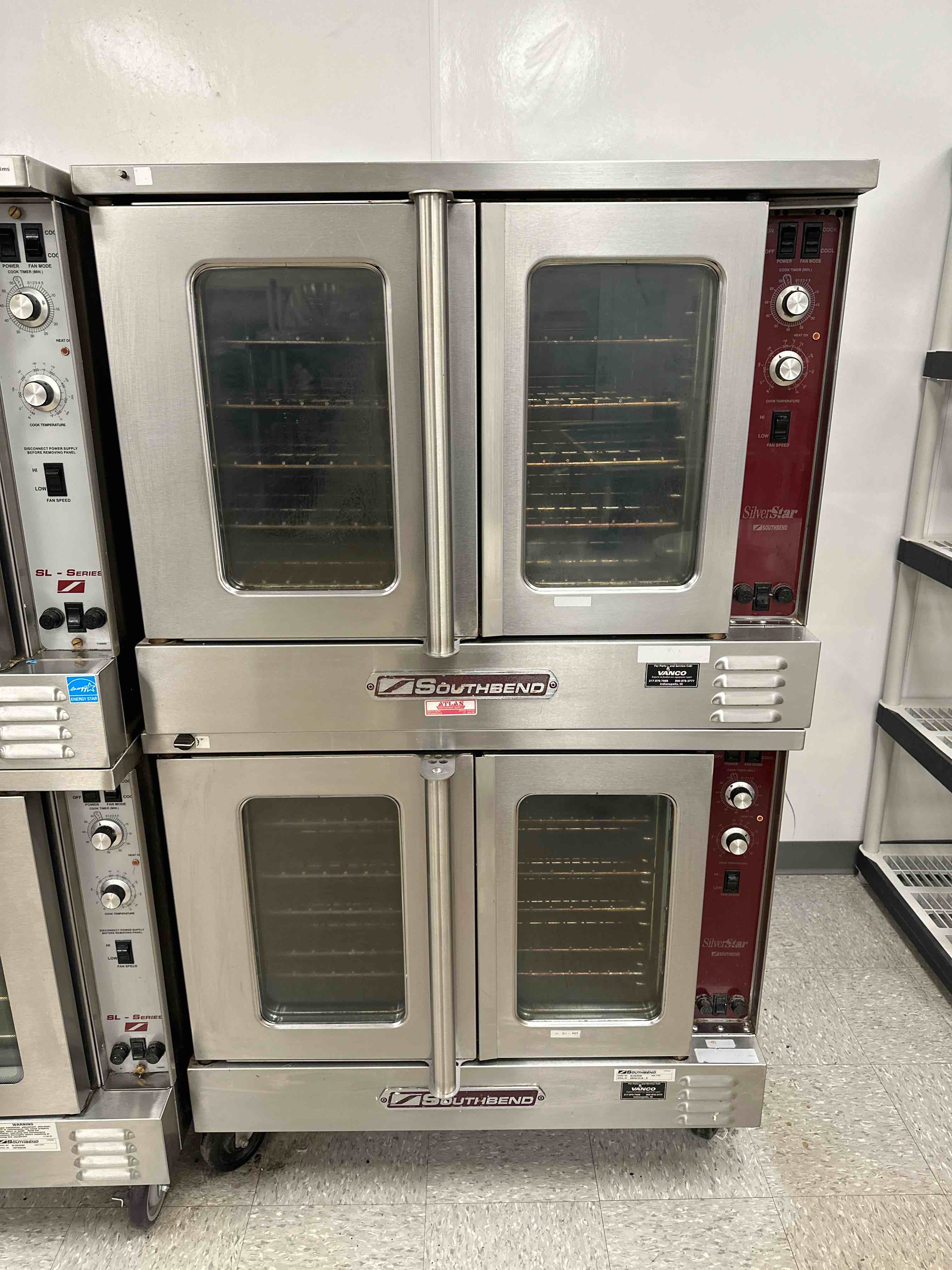 SOUTHBEND FULL SIZE STAINLESS STEEL ELECTRIC DOUBLE STACK CONVECTION OVENS ON CASTERS