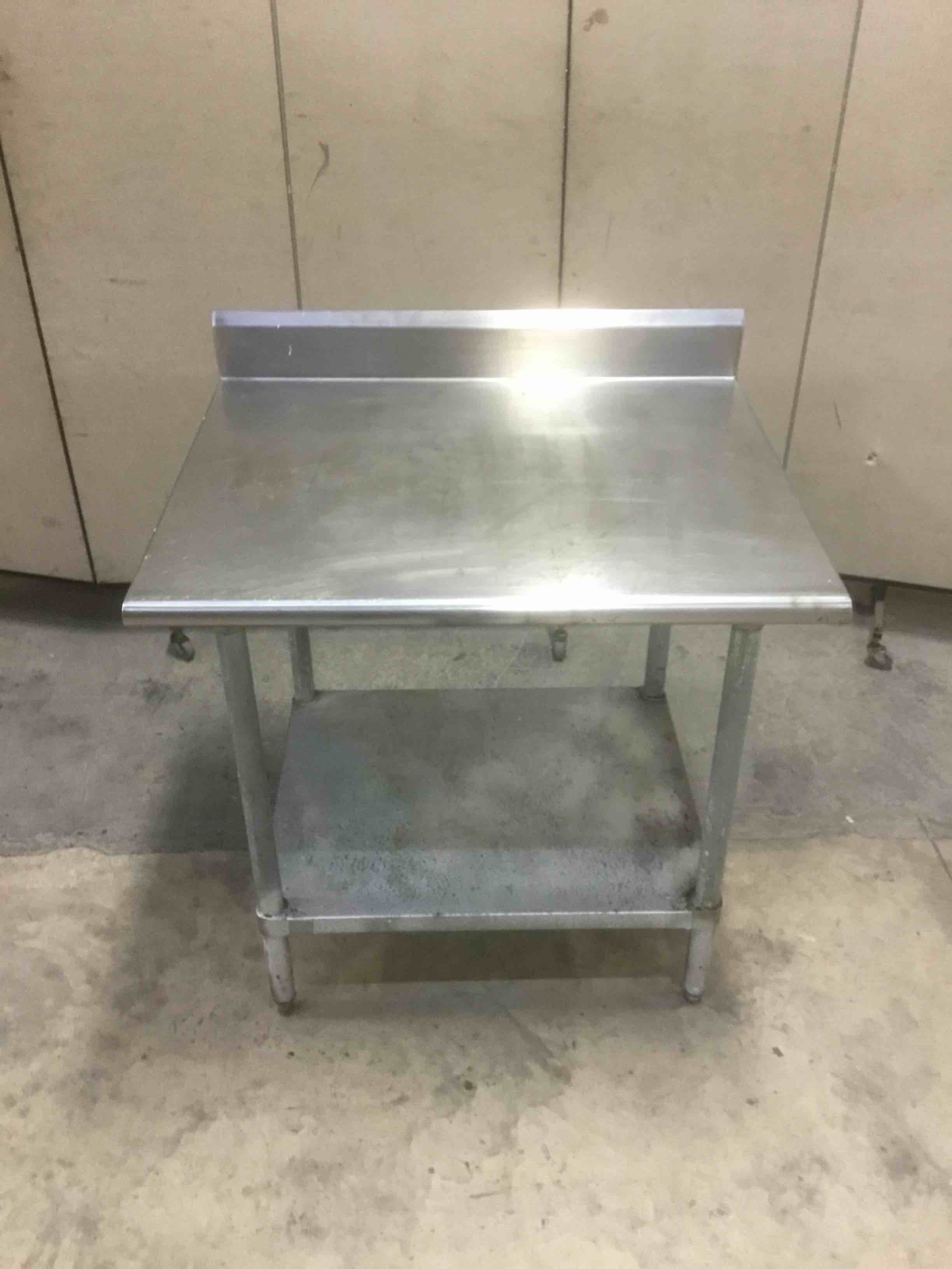36 INCH STAINLESS STEEL TABLE WITH UNDERSHELF AND 5 INCH BACKSPLASH 