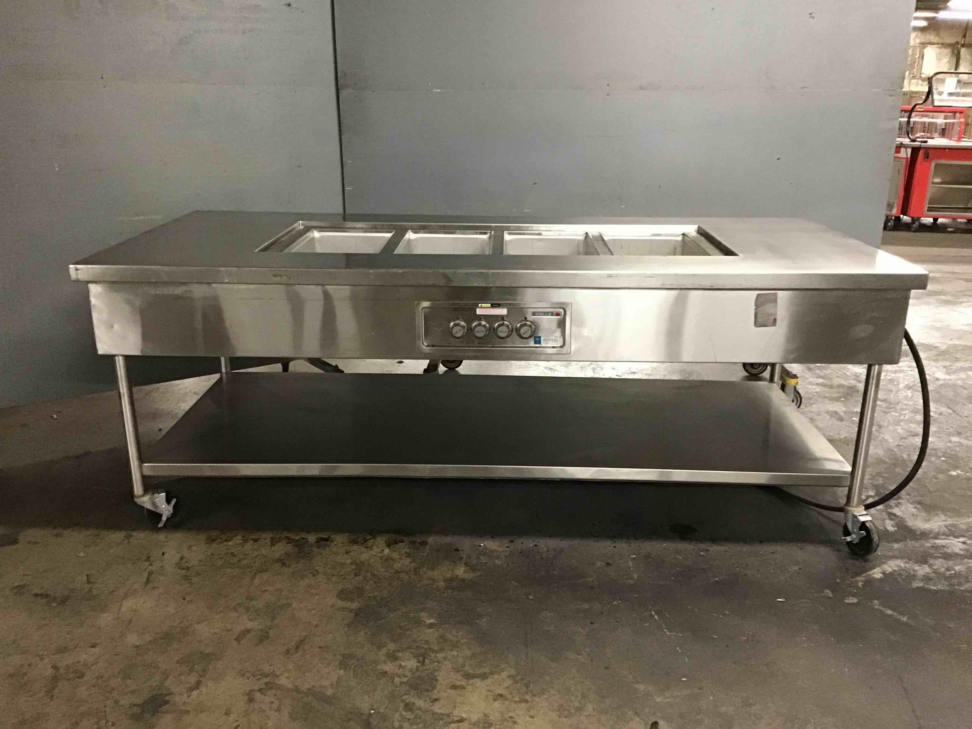 Wells Stainless Steel 95.78 Inch 4 Well Steam Table On Casters