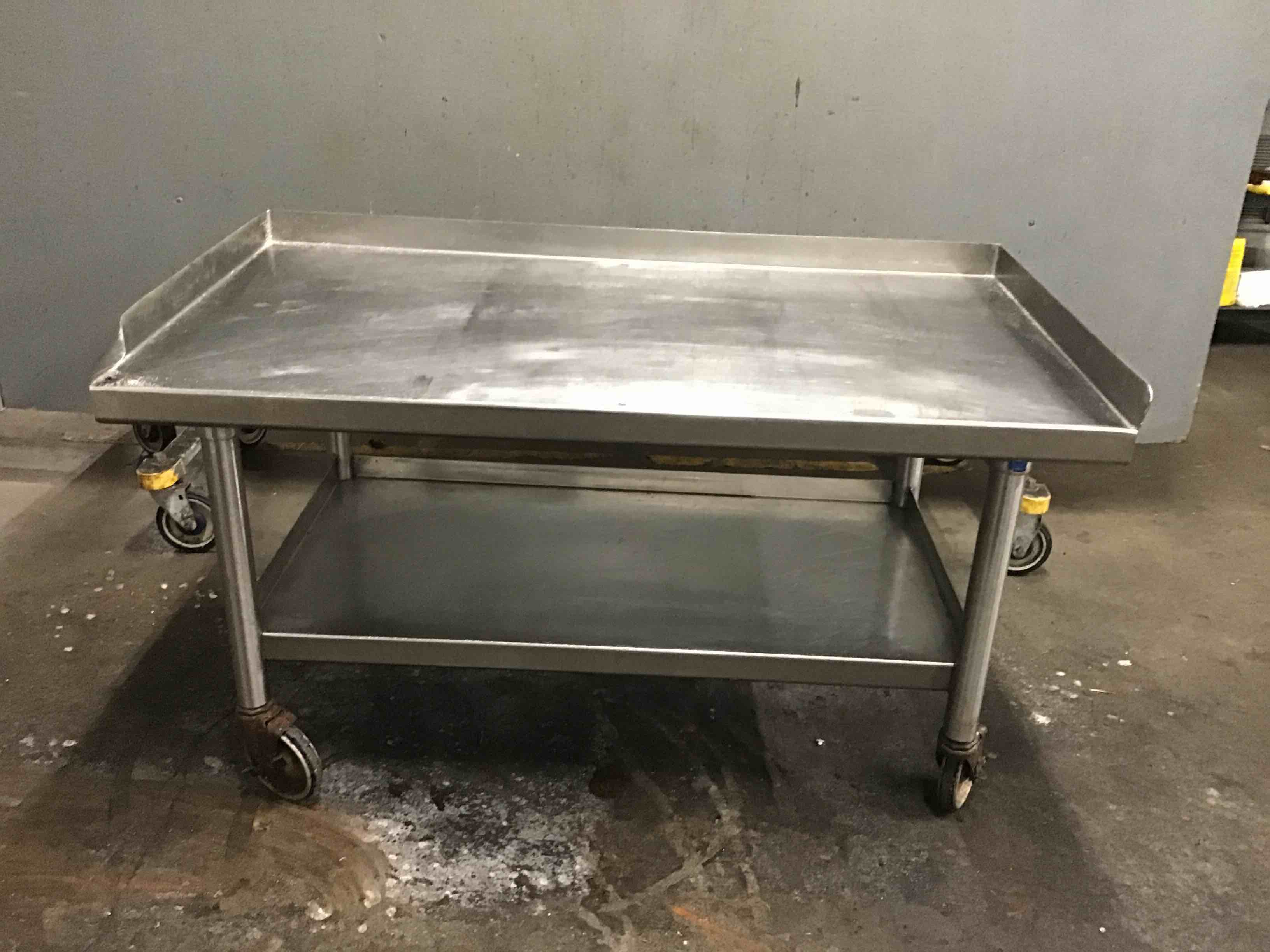 Stainless Steel 44.25 Inch Equipment Stand With Under Shelf On Casters