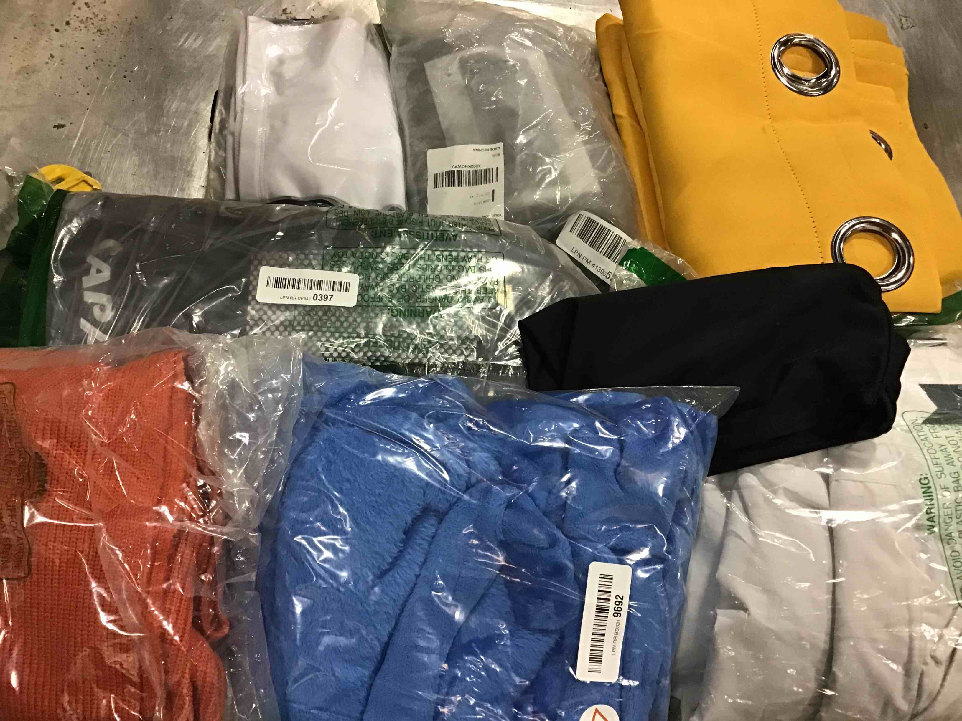 Assortment of clothes of different style and size (10 pieces)