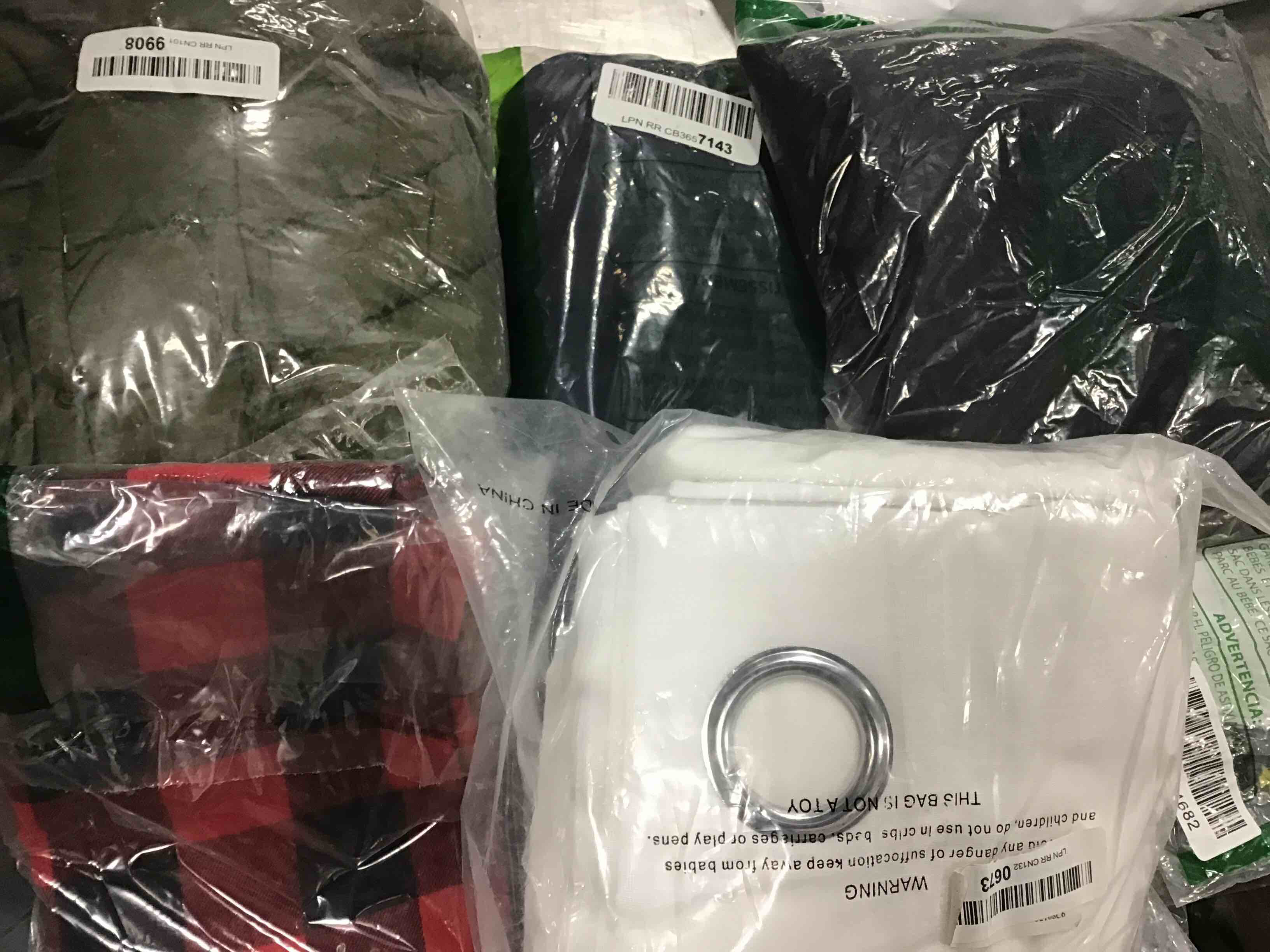 Assortment of clothes of different style and size (15 pieces)