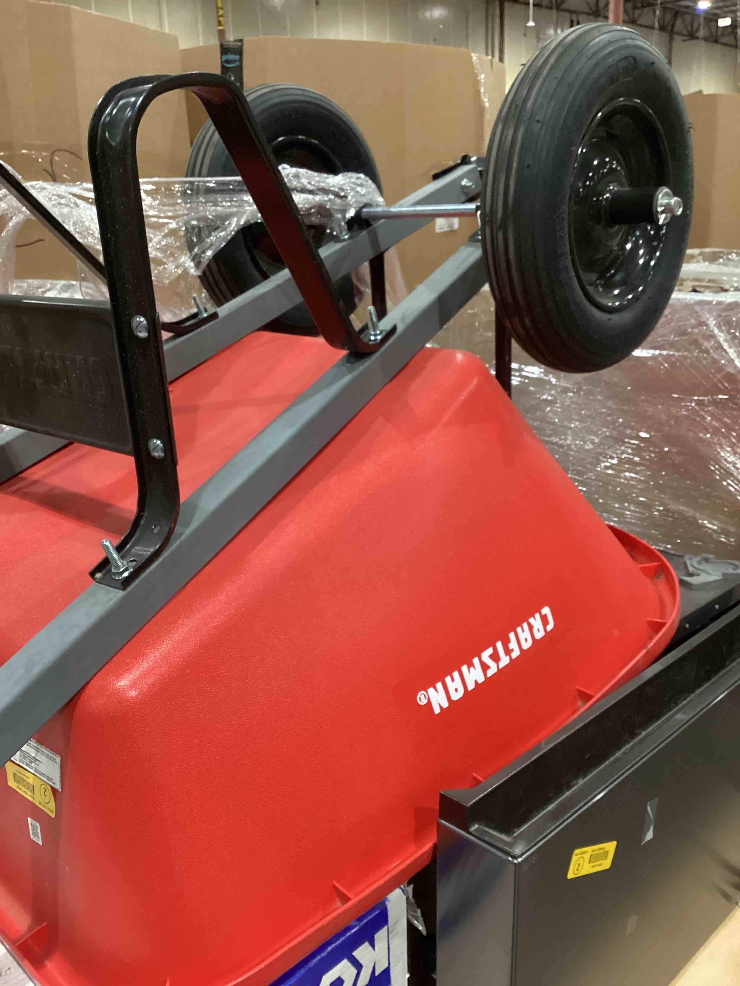 Condition photo showing As Is for craftsman premium contractor grade steel double wheel wheelbarrow with steel handle and ribbed tire, 6 cubic feet