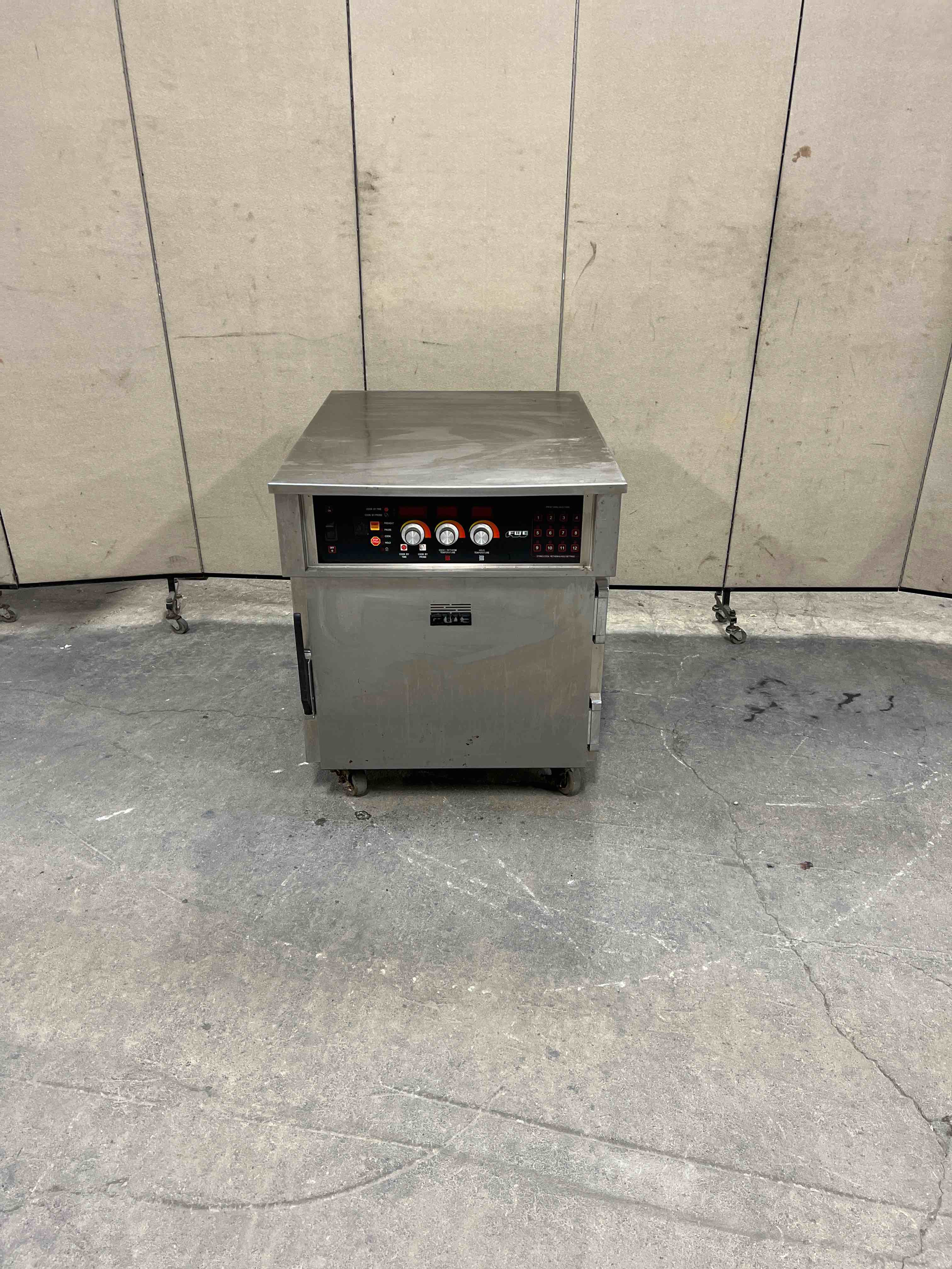 FWE UNDER COUNTER ELECTRIC COOK N HOLD ON CASTERS 