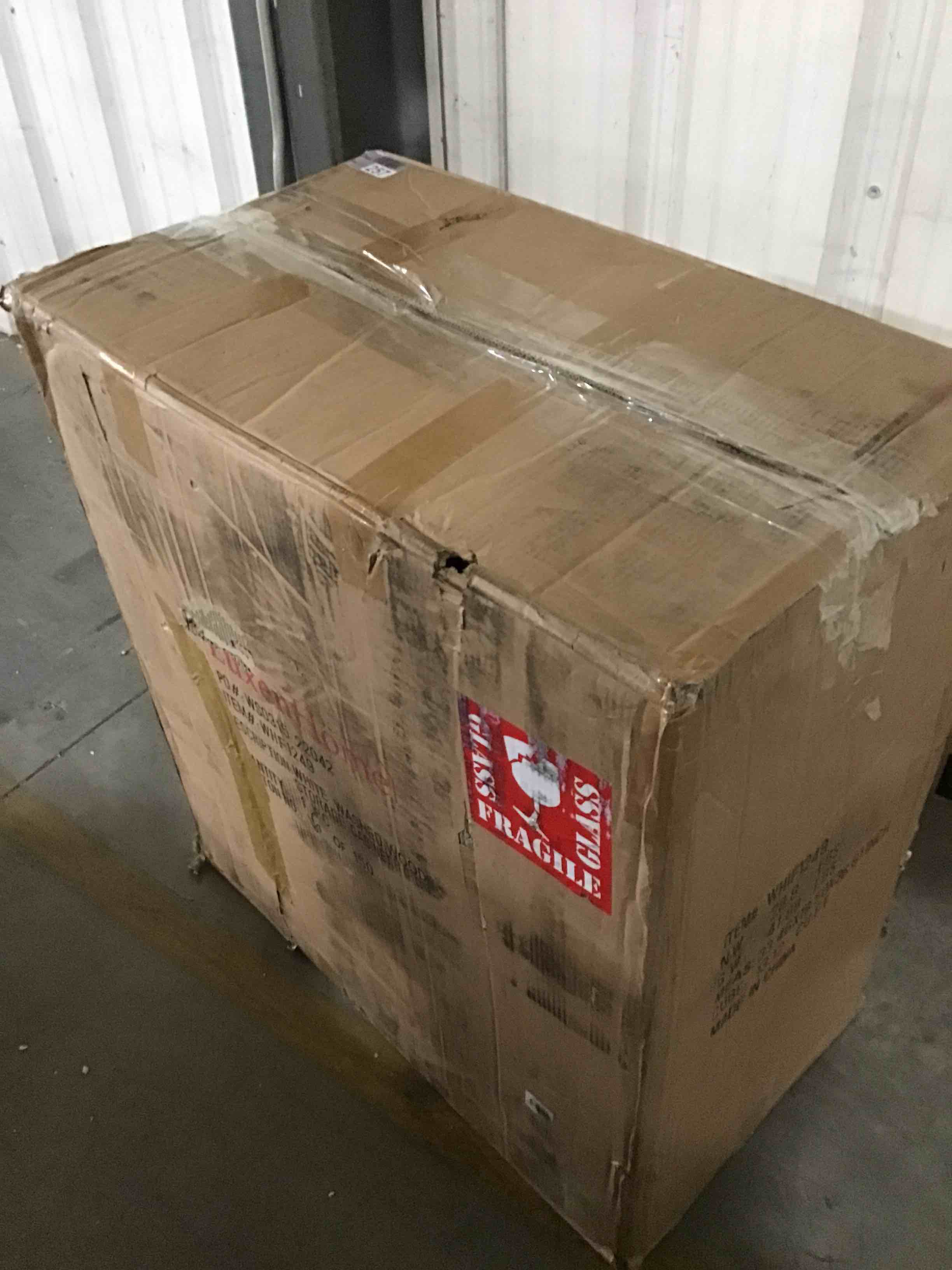 https://s3.amazonaws.com/lotting-images-prod/bidfta/ORG5097058_1696084359421.jpeg