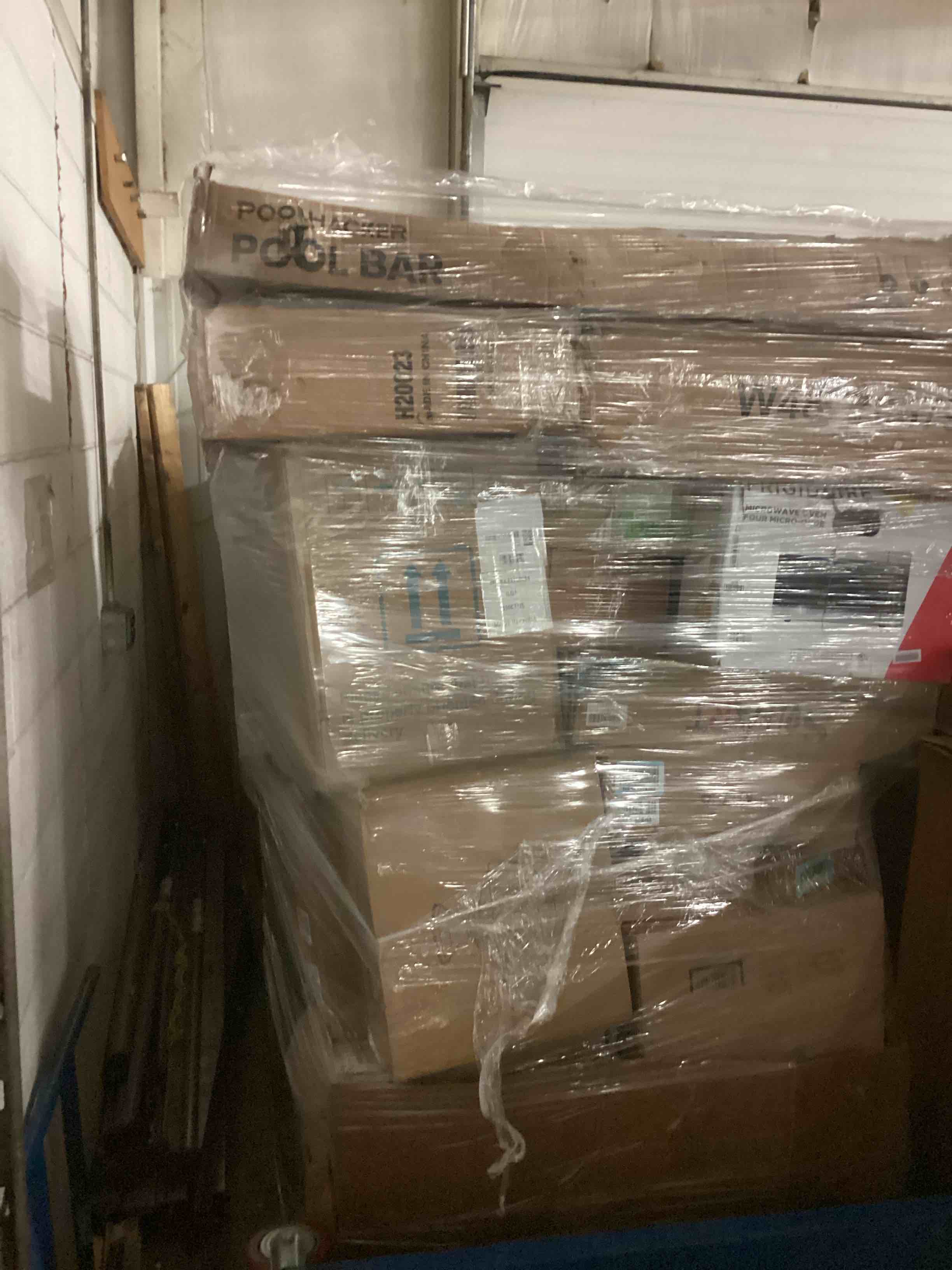Pallet Lot of Assorted Home Goods. Microwave, pool bar, Lighting and More.