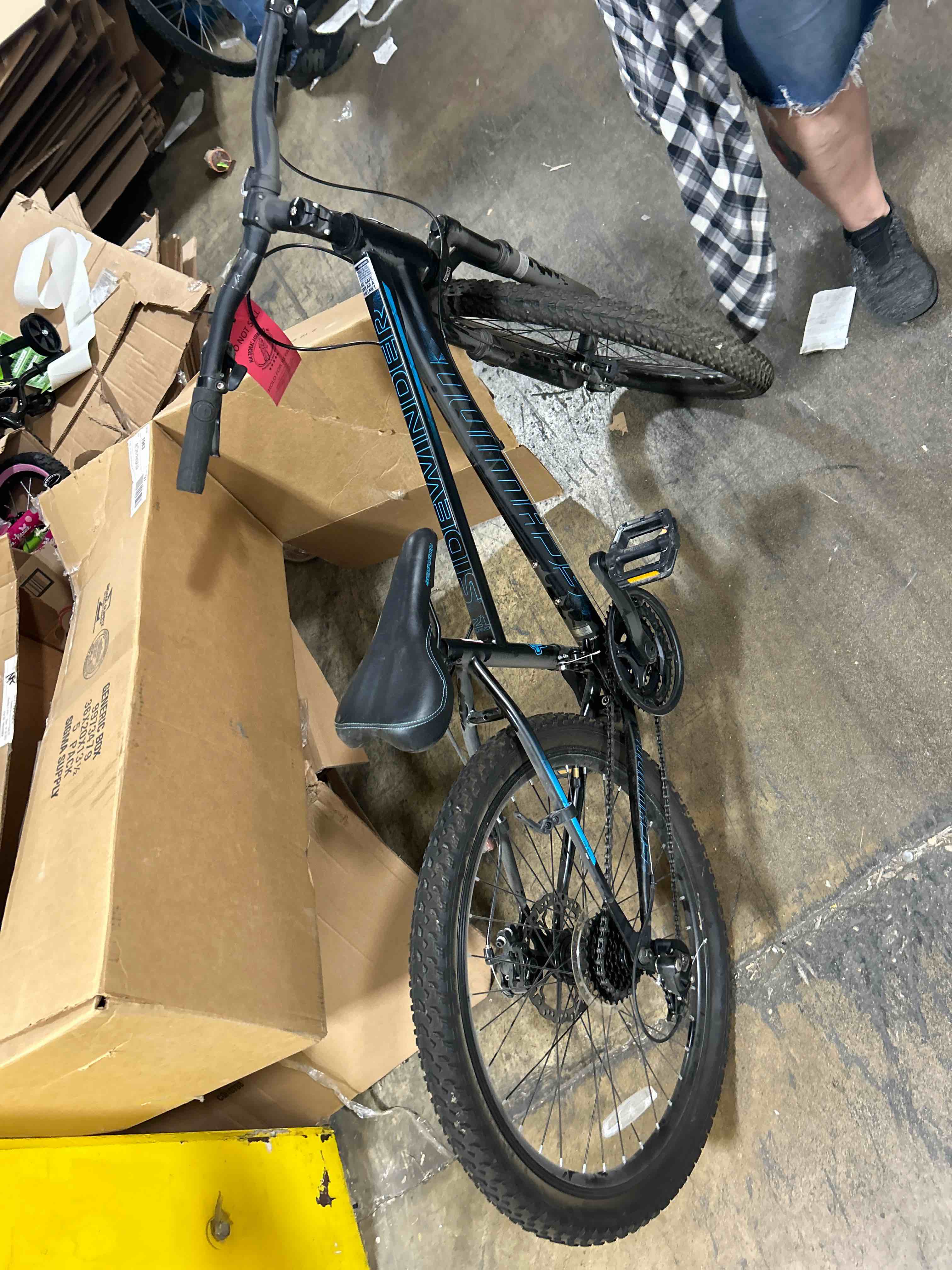 Schwinn Sidewinder mountain bike, 24-inch wheels, 21 speeds, black / teal