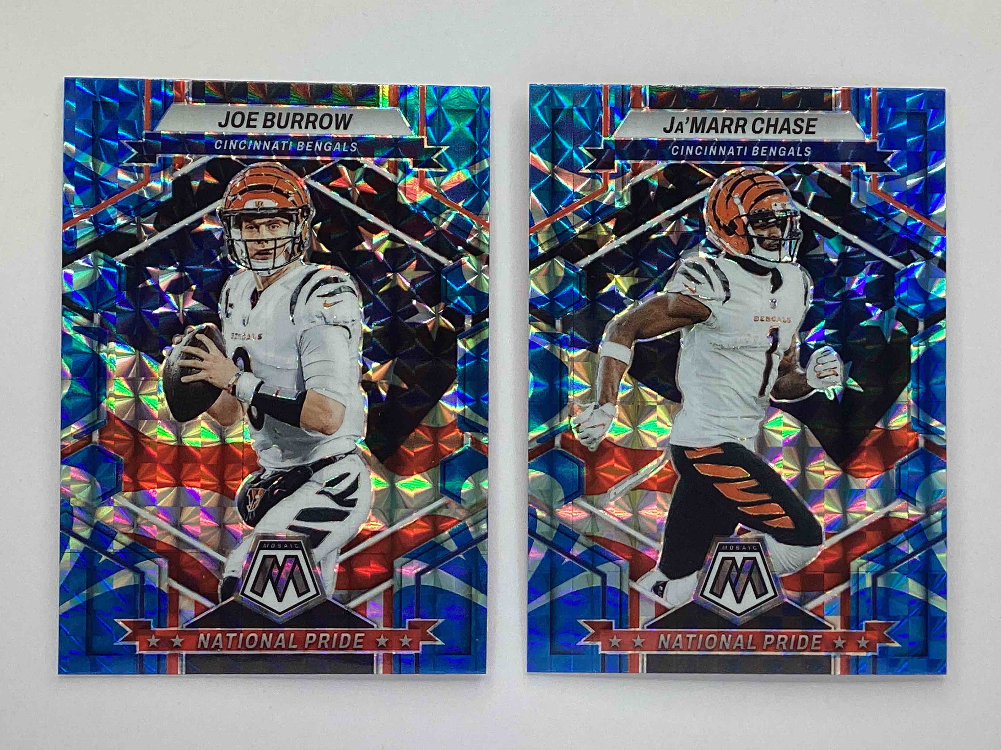 National Pride!  Two Awesome Matching National Pride Cards, Joe Burrow & Ja’ Marr Chase Mosaic 2023 Blue Prizm Reactive!  Gorgeous!  Hard To Collect, Both Mint!    