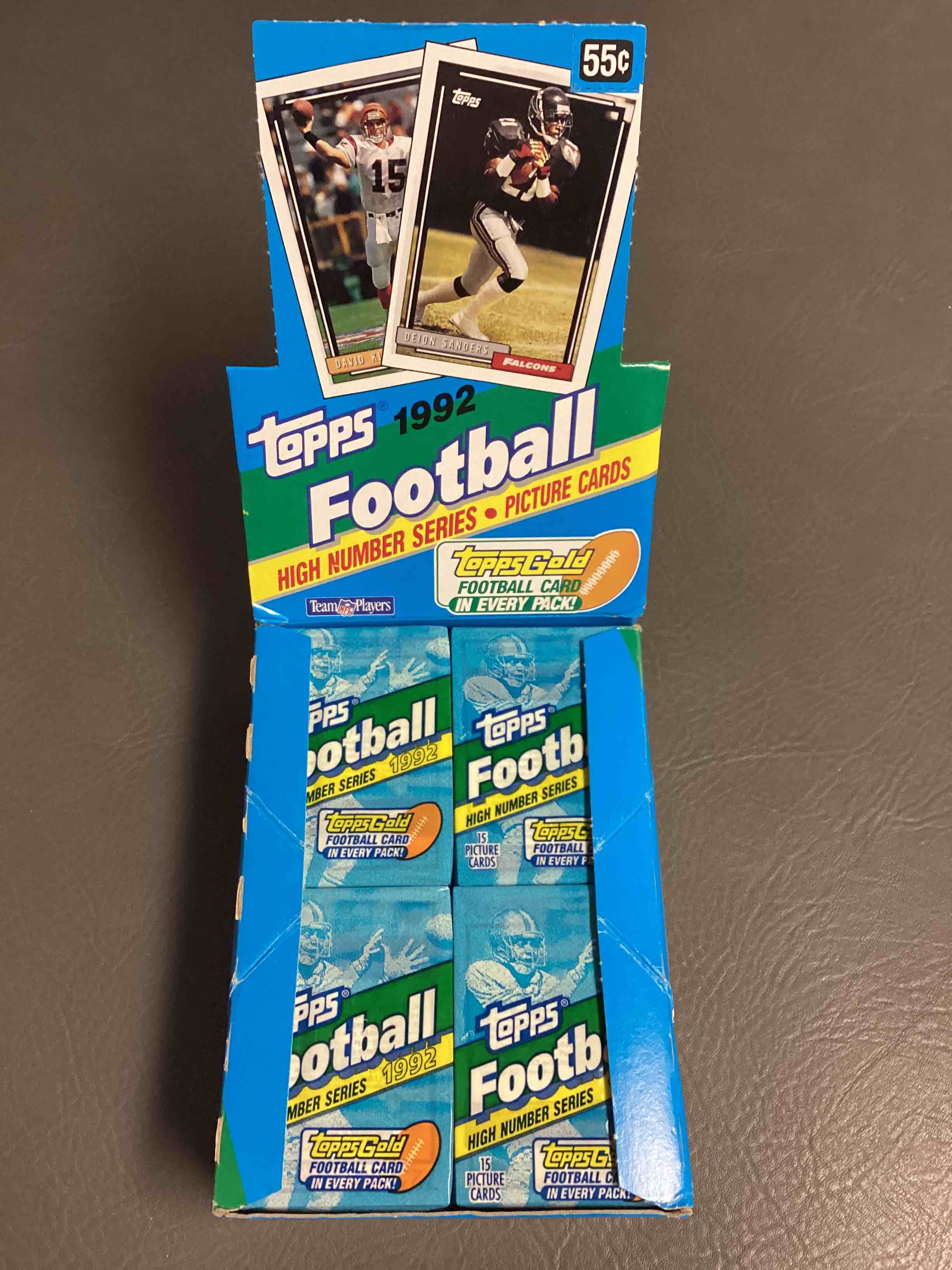 Rare!  1992 Topps Football High Number Series Unopened Wax Pack, Direct From Original Sealed Retail Case.  Sought After By Collectors Because Each Pack Has A Topps Gold Card!  Search For tons Of Stars Like Montana, Rice, Barry Sanders, Emmit Smith & So Much More!