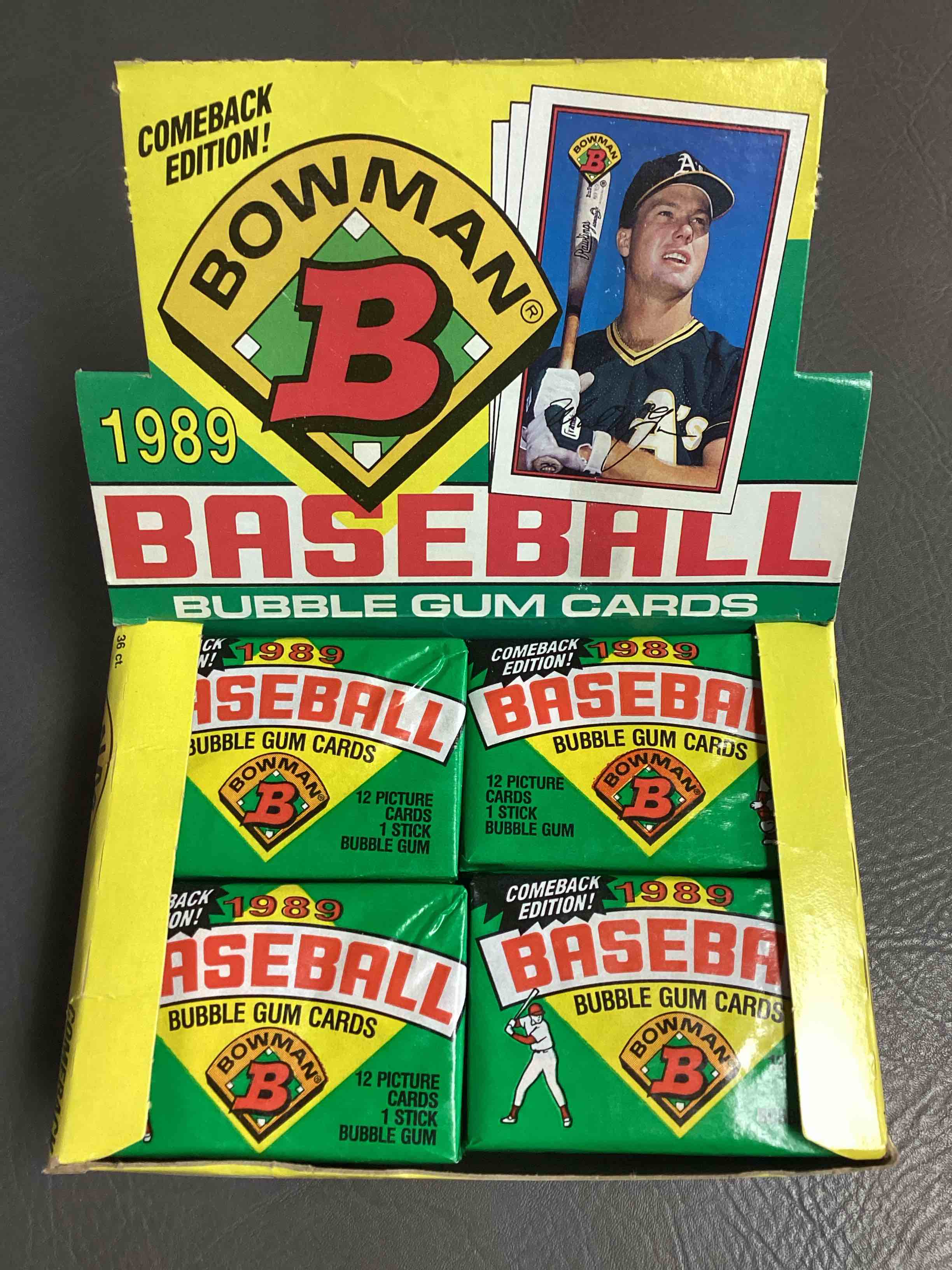 Here It Is!  1989 Bowman Unopened Wax Pack, Direct From Original Retail Case!  Search For The True 1989 Bowman Ken Griffey Jr. Rookie #220 (PSA 10 Value $275), Valuable Bo Jackson & Nolan Ryan Cards & Much More!  Sough after By Collectors As This Is Bowman’s Comeback Set After More Than 30 Years!  Excellent Condition!