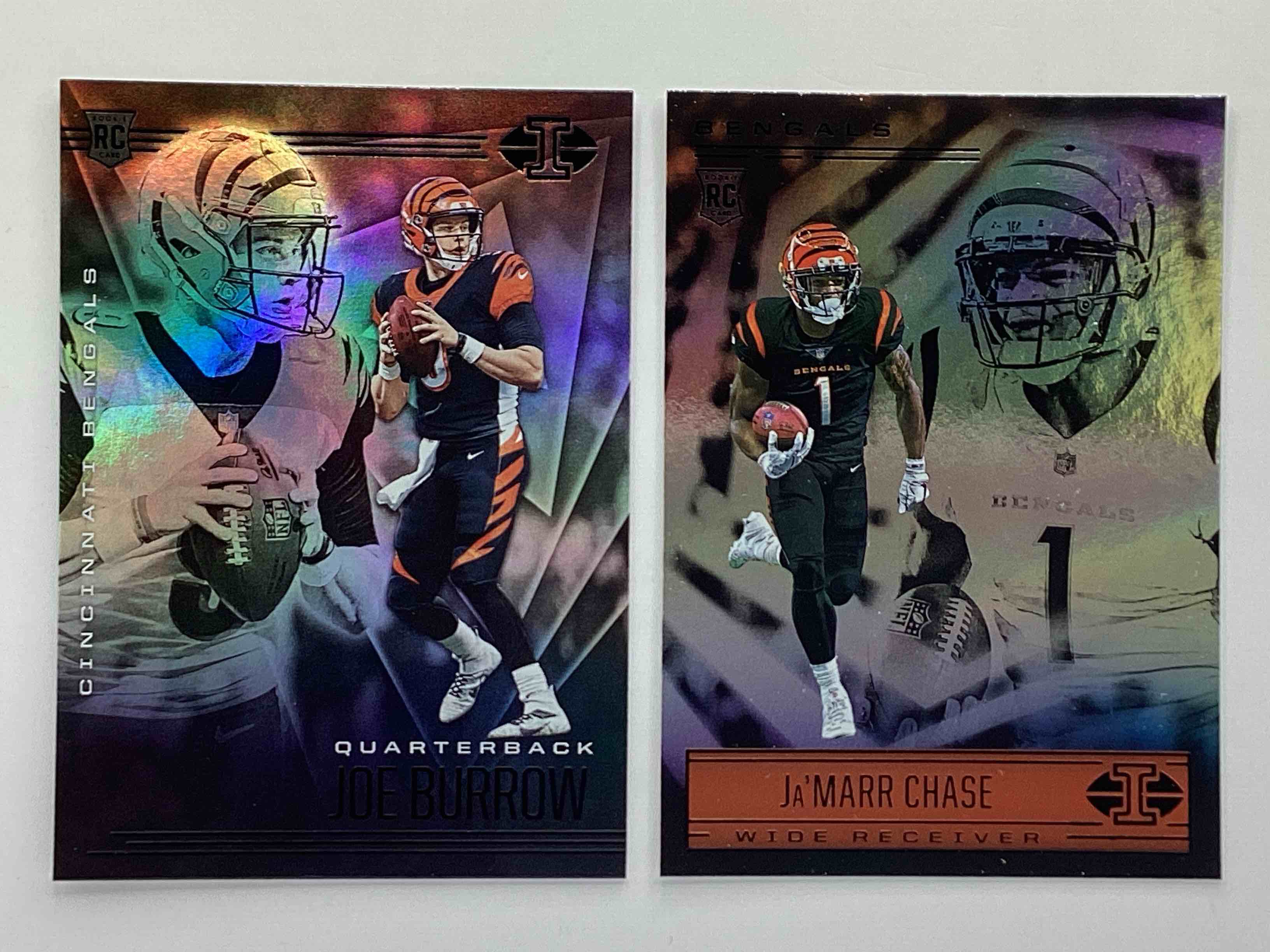 Matching Rookies!  Two Rare Matching Illusions Rookie Cards, Joe Burrow 2020 & Ja’ Marr Chase 2021!  Hard To Collect!  Both Rookies, Both Gorgeous & Both Mint!