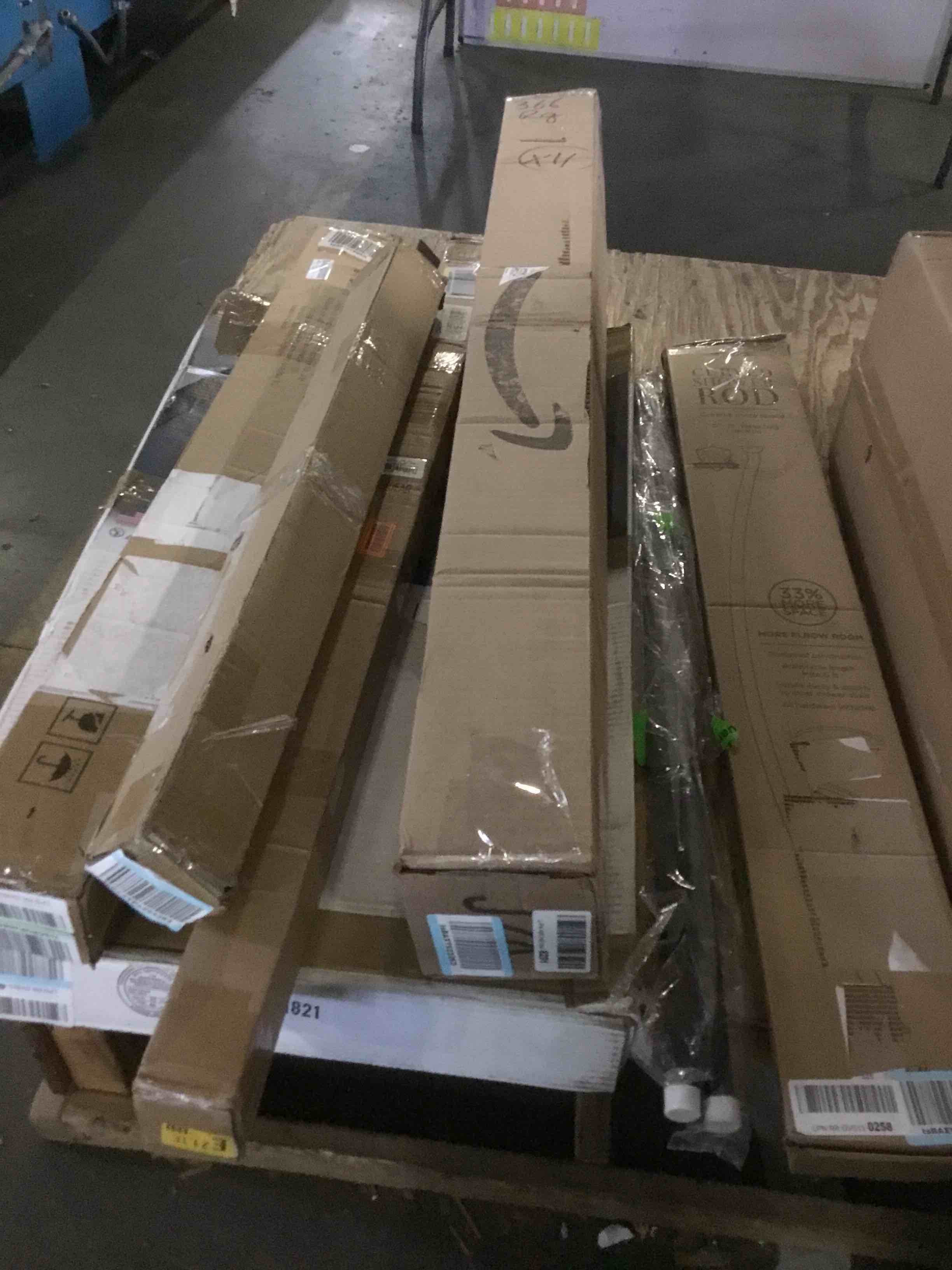 assorted miscellaneous items (curtain rods,window deflectors and more)