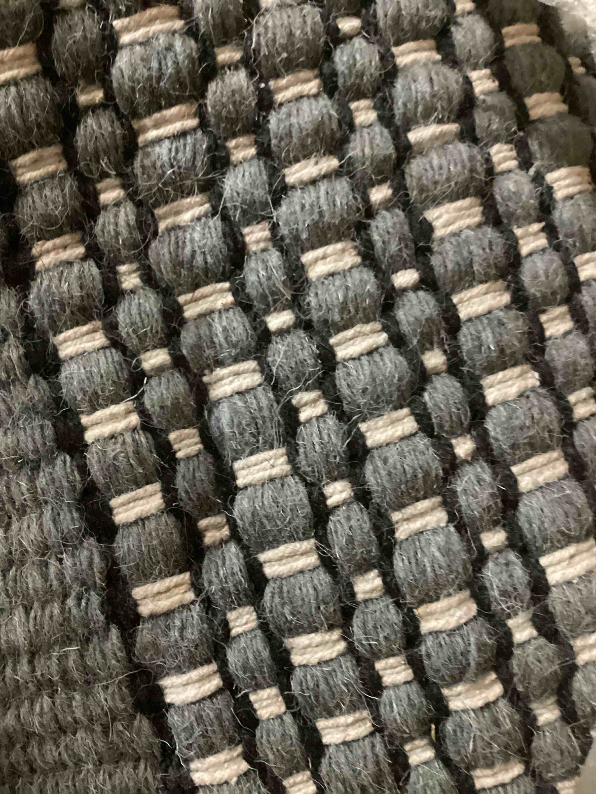 Green and White Wool Rug (size unknown) 