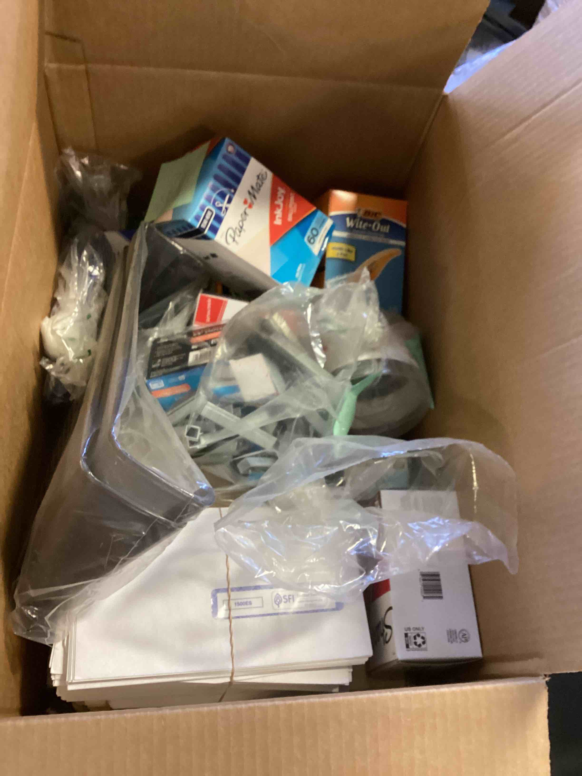 assorted of office includes, paper, pens, scotch and much more 